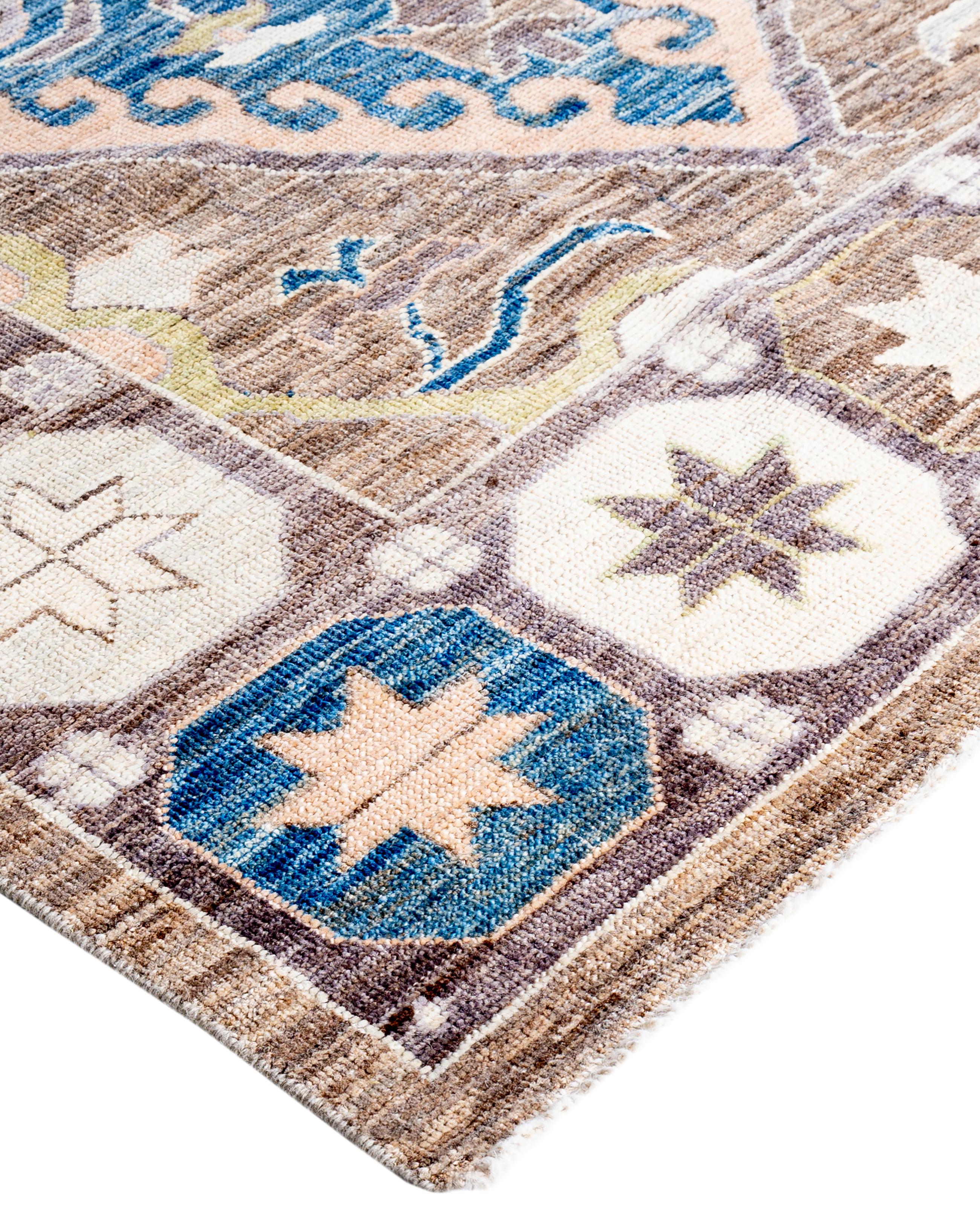 Oushak rugs are known for their soft, muted color palettes and large-scale, flowing designs. They often feature soft tones like beige, cream, gold, and light blue, with motifs that include palmettes, vines, and geometric shapes. These rugs are