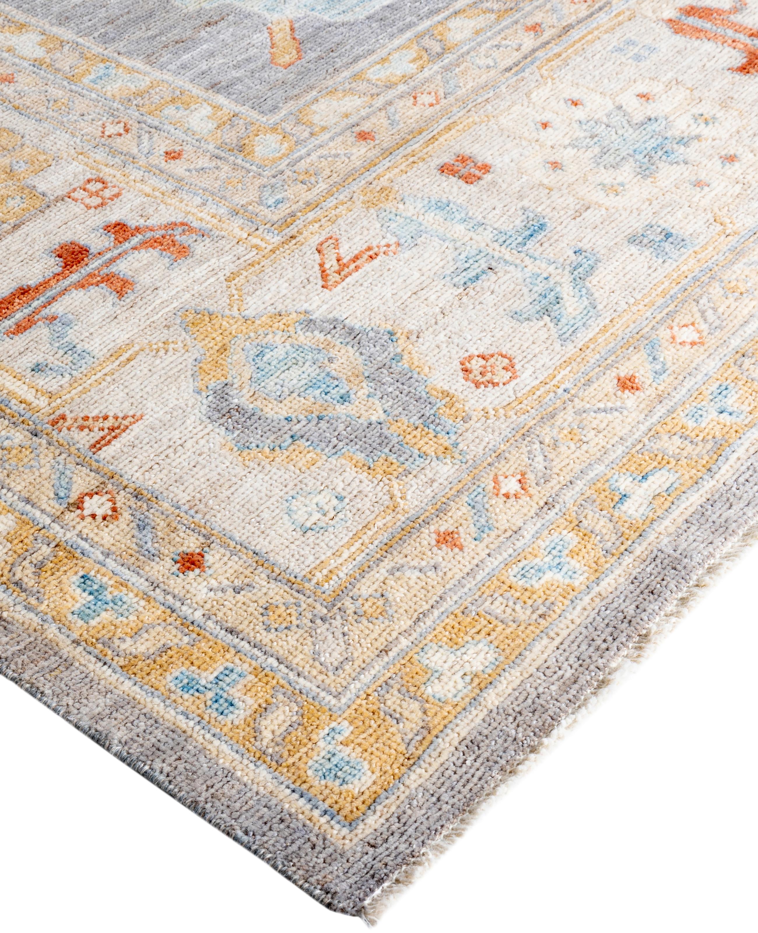 Oushak rugs are known for their soft, muted color palettes and large-scale, flowing designs. They often feature soft tones like beige, cream, gold, and light blue, with motifs that include palmettes, vines, and geometric shapes. These rugs are