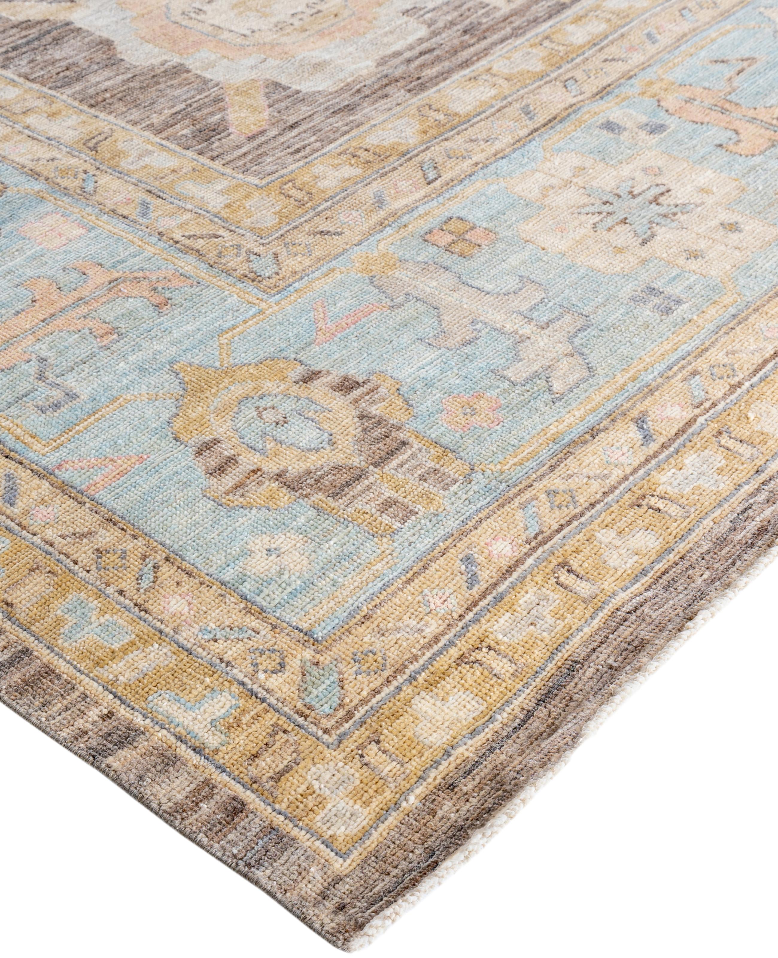 Oushak rugs are known for their soft, muted color palettes and large-scale, flowing designs. They often feature soft tones like beige, cream, gold, and light blue, with motifs that include palmettes, vines, and geometric shapes. These rugs are