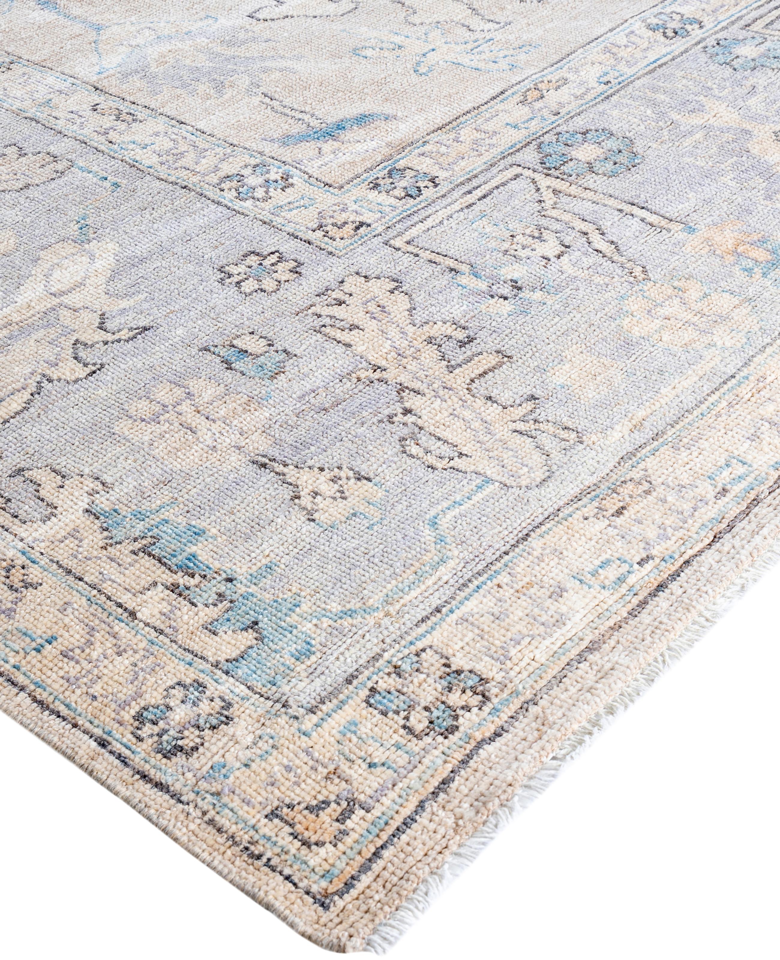 Oushak rugs are known for their soft, muted color palettes and large-scale, flowing designs. They often feature soft tones like beige, cream, gold, and light blue, with motifs that include palmettes, vines, and geometric shapes. These rugs are