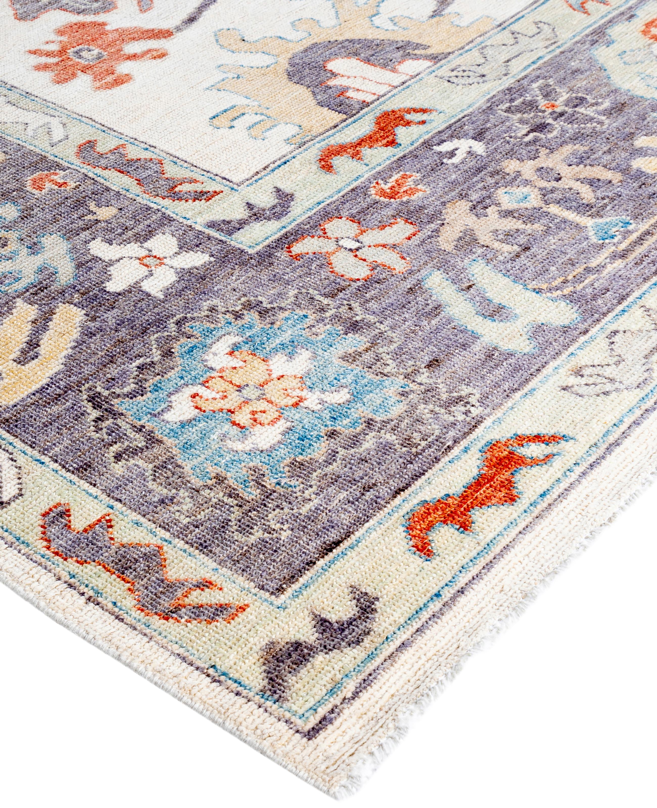 Oushak rugs are known for their soft, muted color palettes and large-scale, flowing designs. They often feature soft tones like beige, cream, gold, and light blue, with motifs that include palmettes, vines, and geometric shapes. These rugs are