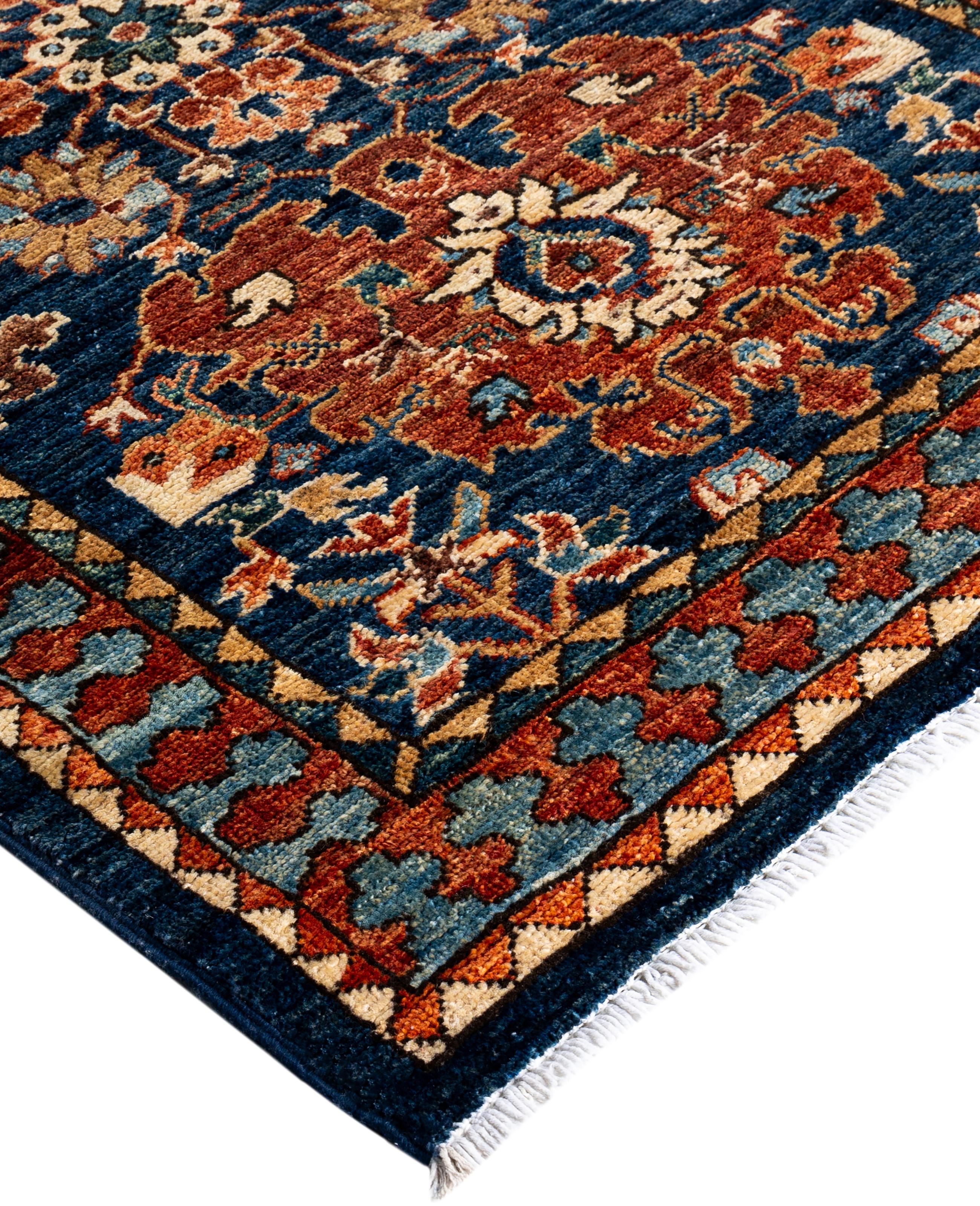 Serapi rugs are known for their bold, geometric designs and rich colors, often featuring a central medallion surrounded by intricate patterns. They typically use a warm, earthy color palette with deep reds, blues, ivory, and occasional greens. The