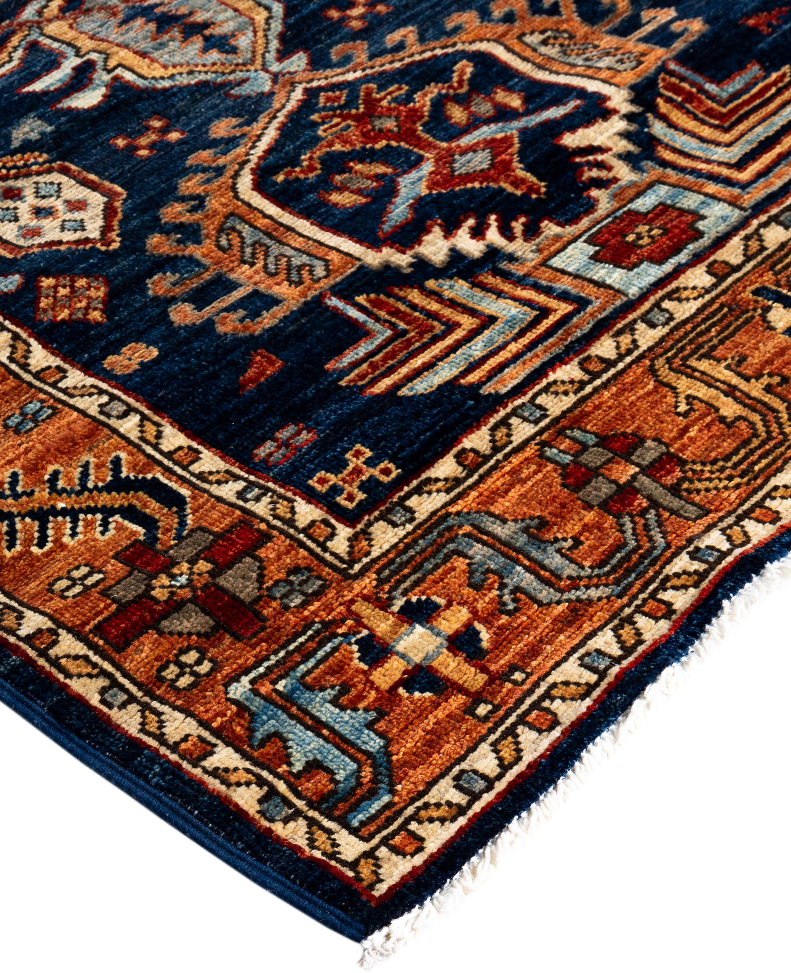 Serapi rugs are known for their bold, geometric designs and rich colors, often featuring a central medallion surrounded by intricate patterns. They typically use a warm, earthy color palette with deep reds, blues, ivory, and occasional greens. The