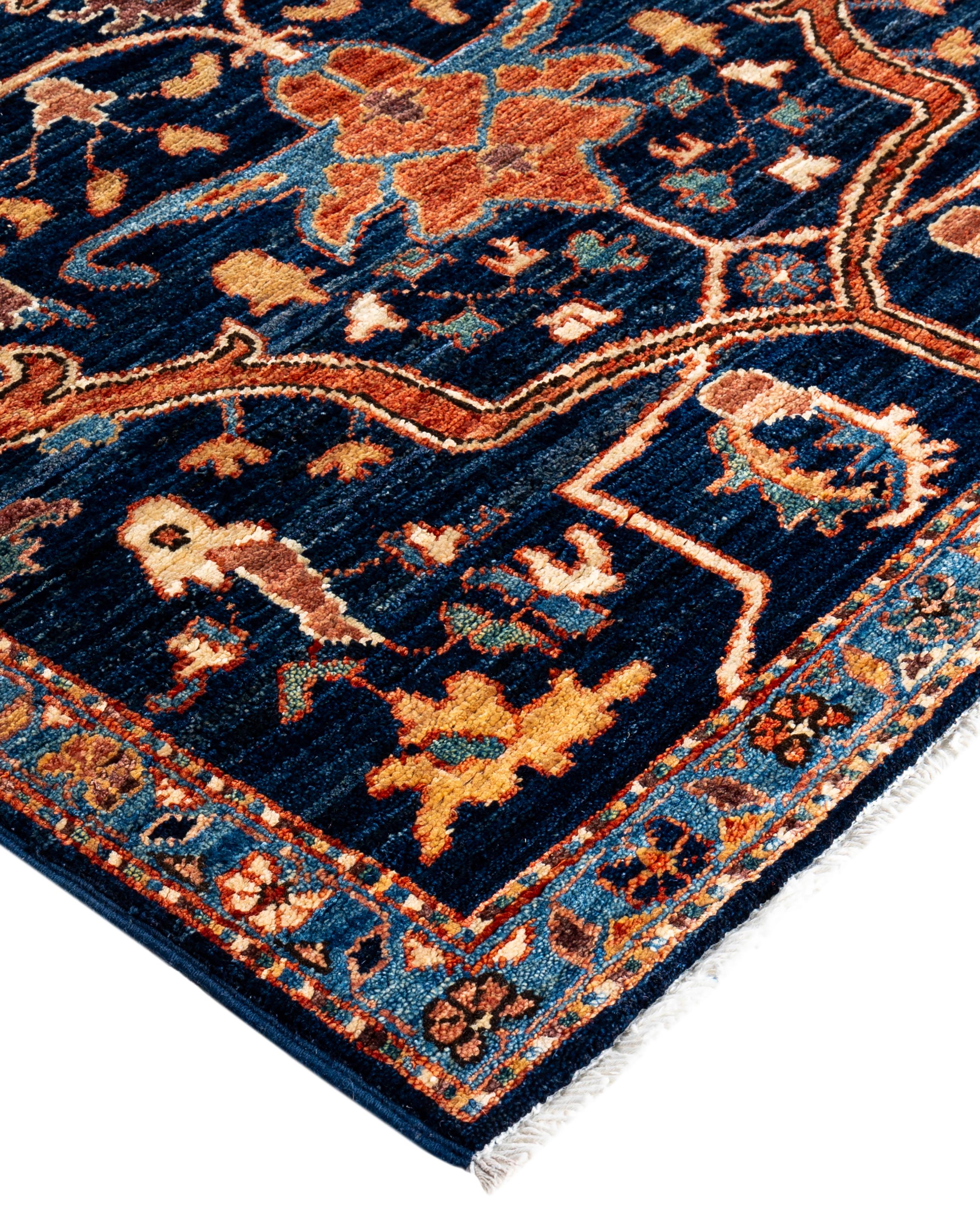 Serapi rugs are known for their bold, geometric designs and rich colors, often featuring a central medallion surrounded by intricate patterns. They typically use a warm, earthy color palette with deep reds, blues, ivory, and occasional greens. The