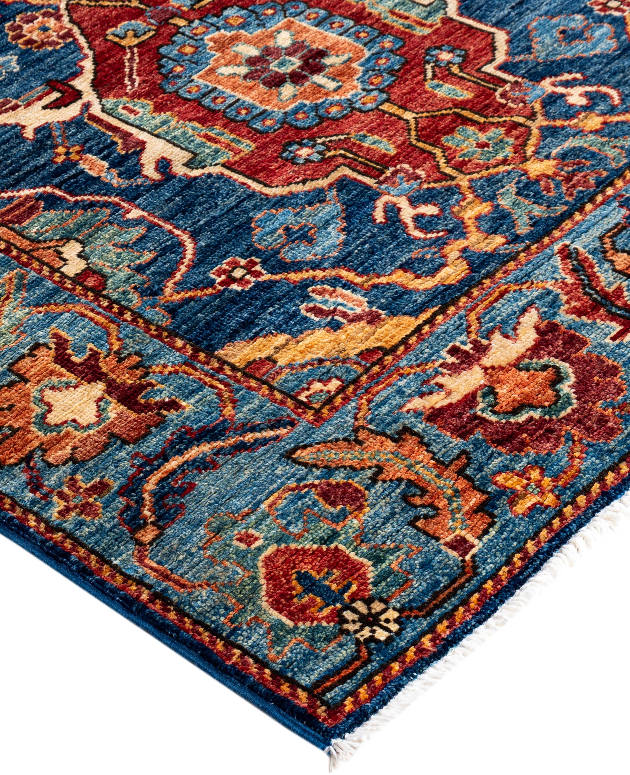 Serapi rugs are known for their bold, geometric designs and rich colors, often featuring a central medallion surrounded by intricate patterns. They typically use a warm, earthy color palette with deep reds, blues, ivory, and occasional greens. The