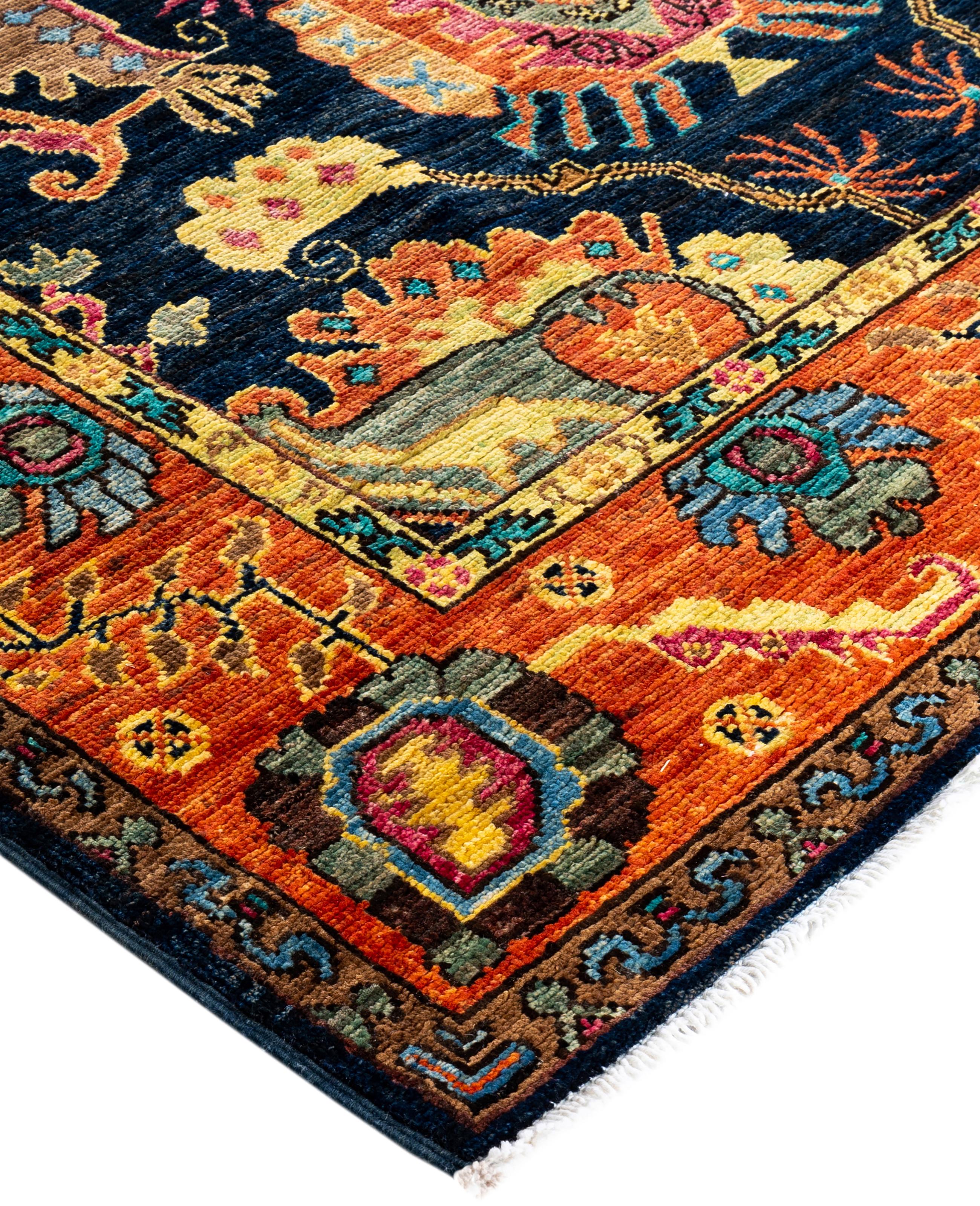 Serapi rugs are known for their bold, geometric designs and rich colors, often featuring a central medallion surrounded by intricate patterns. They typically use a warm, earthy color palette with deep reds, blues, ivory, and occasional greens. The