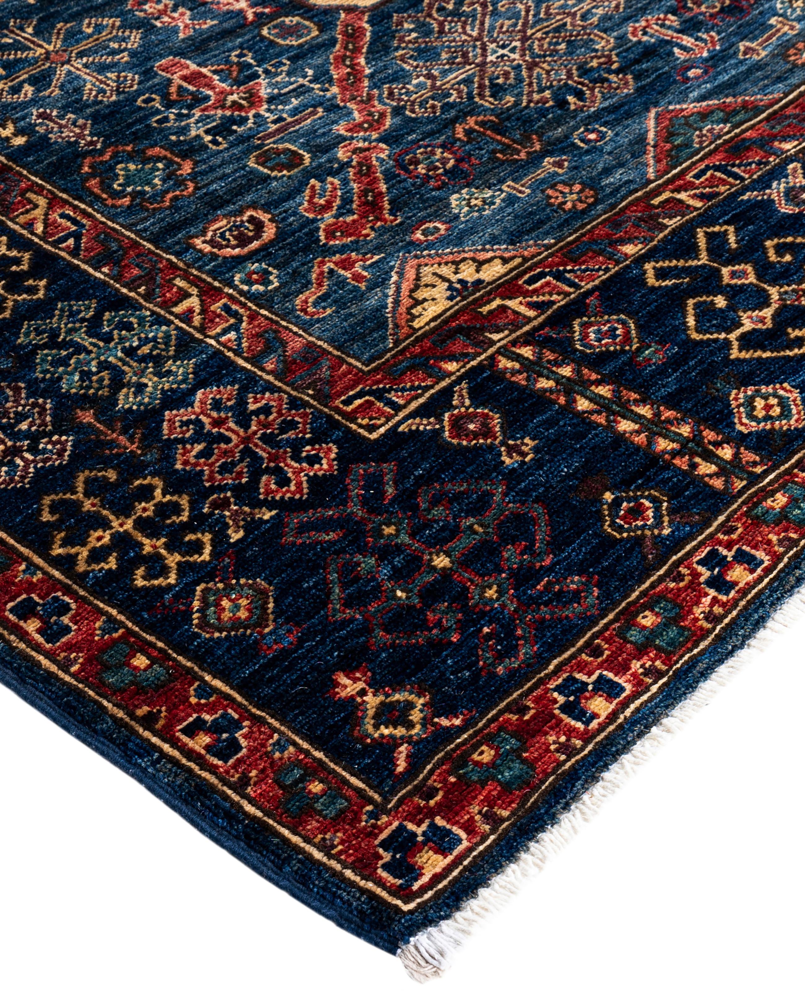 Serapi rugs are known for their bold, geometric designs and rich colors, often featuring a central medallion surrounded by intricate patterns. They typically use a warm, earthy color palette with deep reds, blues, ivory, and occasional greens. The