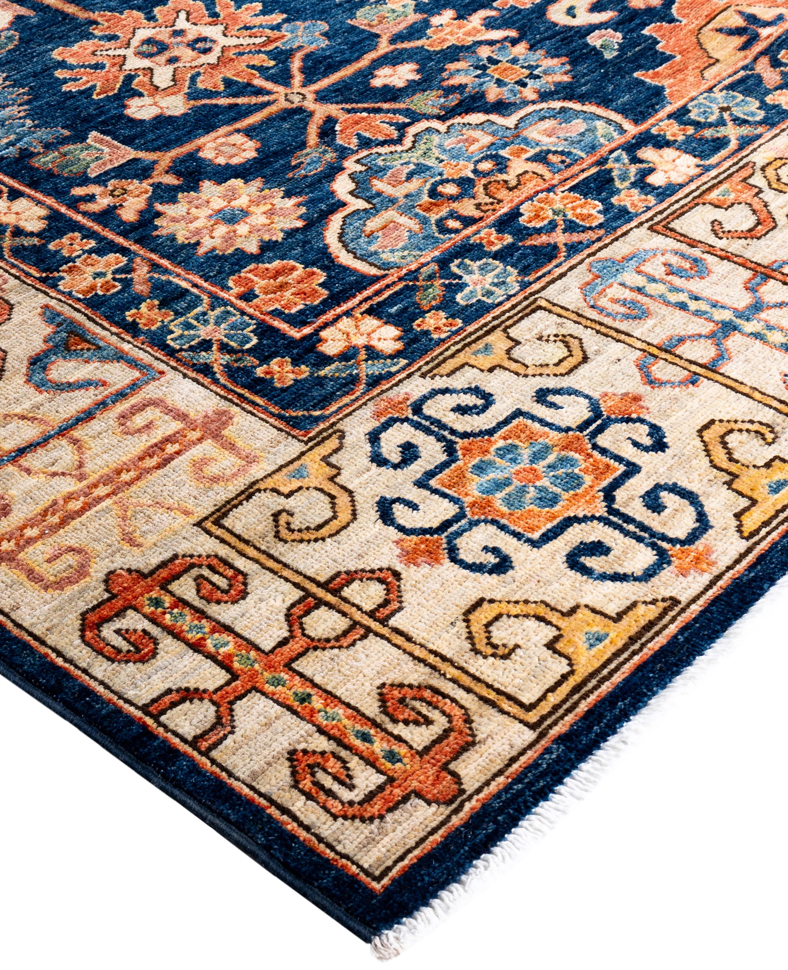 Serapi rugs are known for their bold, geometric designs and rich colors, often featuring a central medallion surrounded by intricate patterns. They typically use a warm, earthy color palette with deep reds, blues, ivory, and occasional greens. The