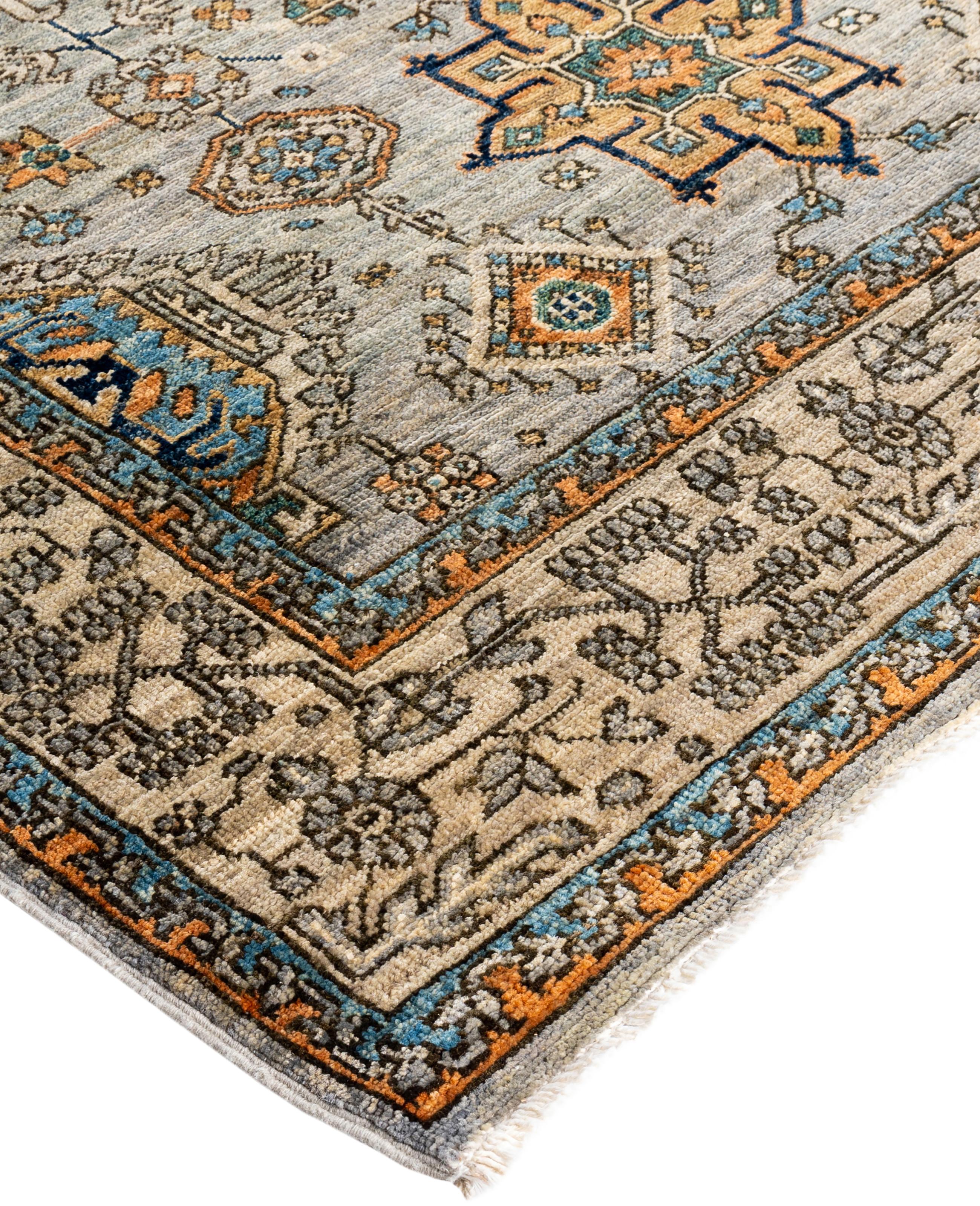 Serapi rugs are known for their bold, geometric designs and rich colors, often featuring a central medallion surrounded by intricate patterns. They typically use a warm, earthy color palette with deep reds, blues, ivory, and occasional greens. The