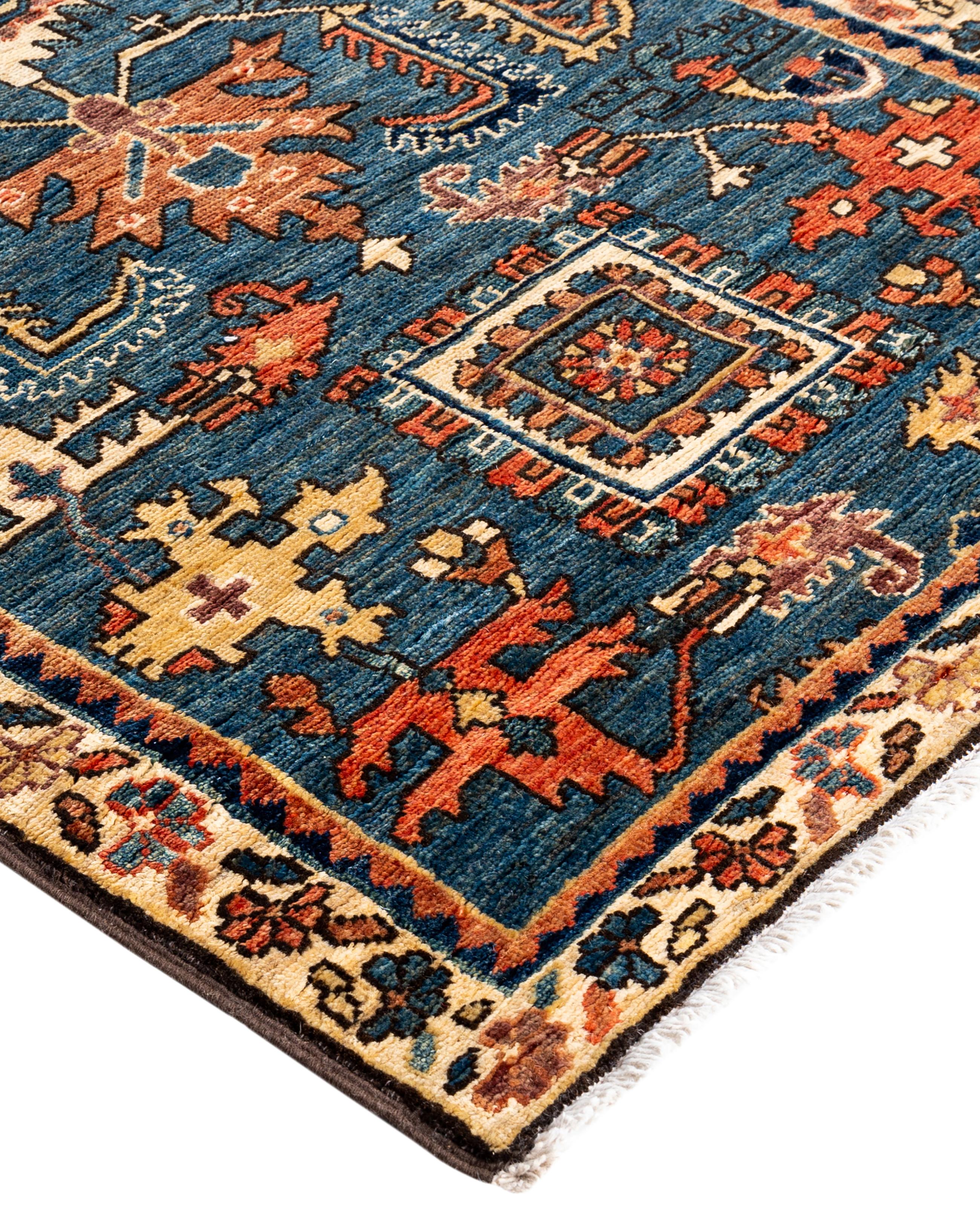 Serapi rugs are known for their bold, geometric designs and rich colors, often featuring a central medallion surrounded by intricate patterns. They typically use a warm, earthy color palette with deep reds, blues, ivory, and occasional greens. The