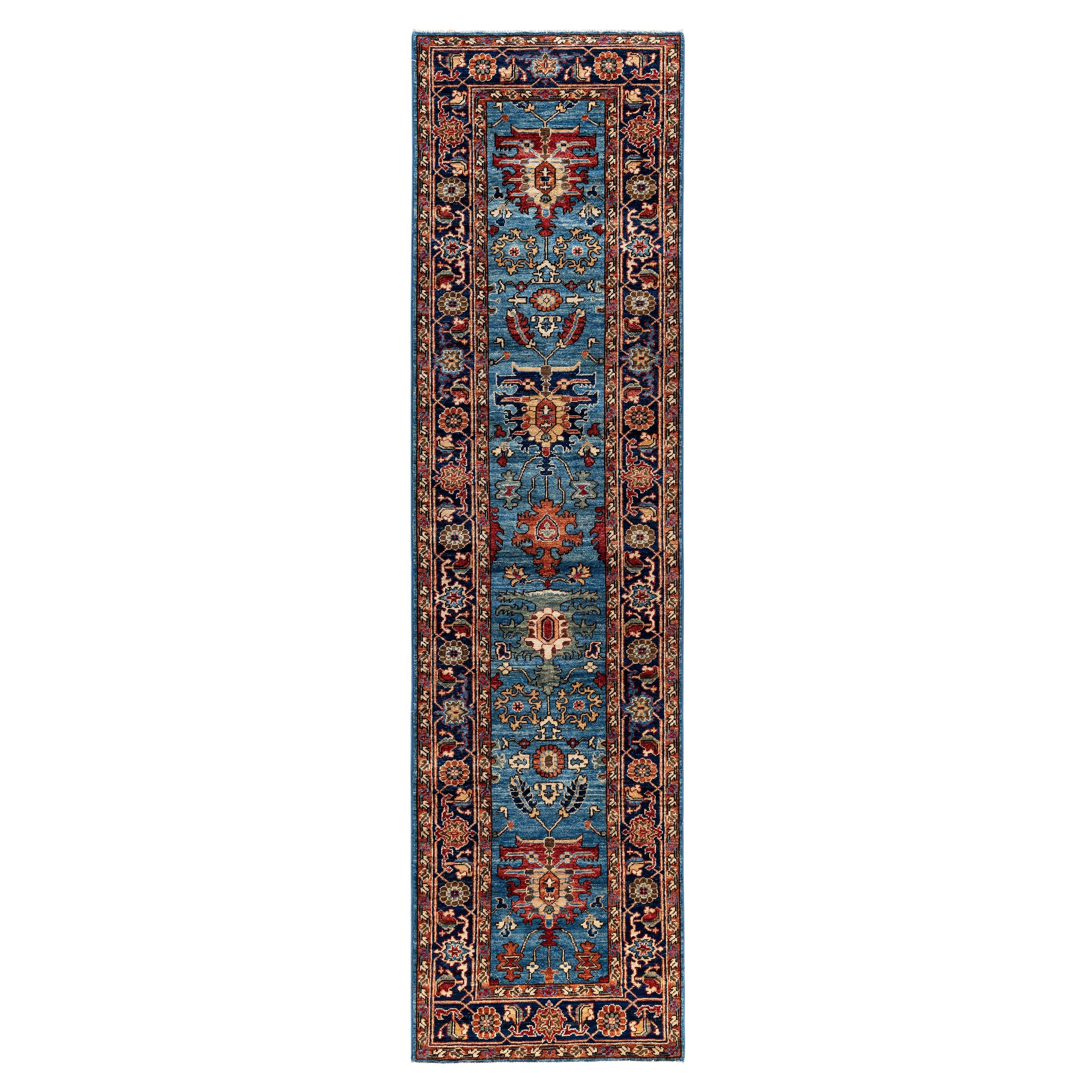 Alfombra tradicional tribal Serapi de lana anudada a mano azul claro 2' 7" x 10' 0