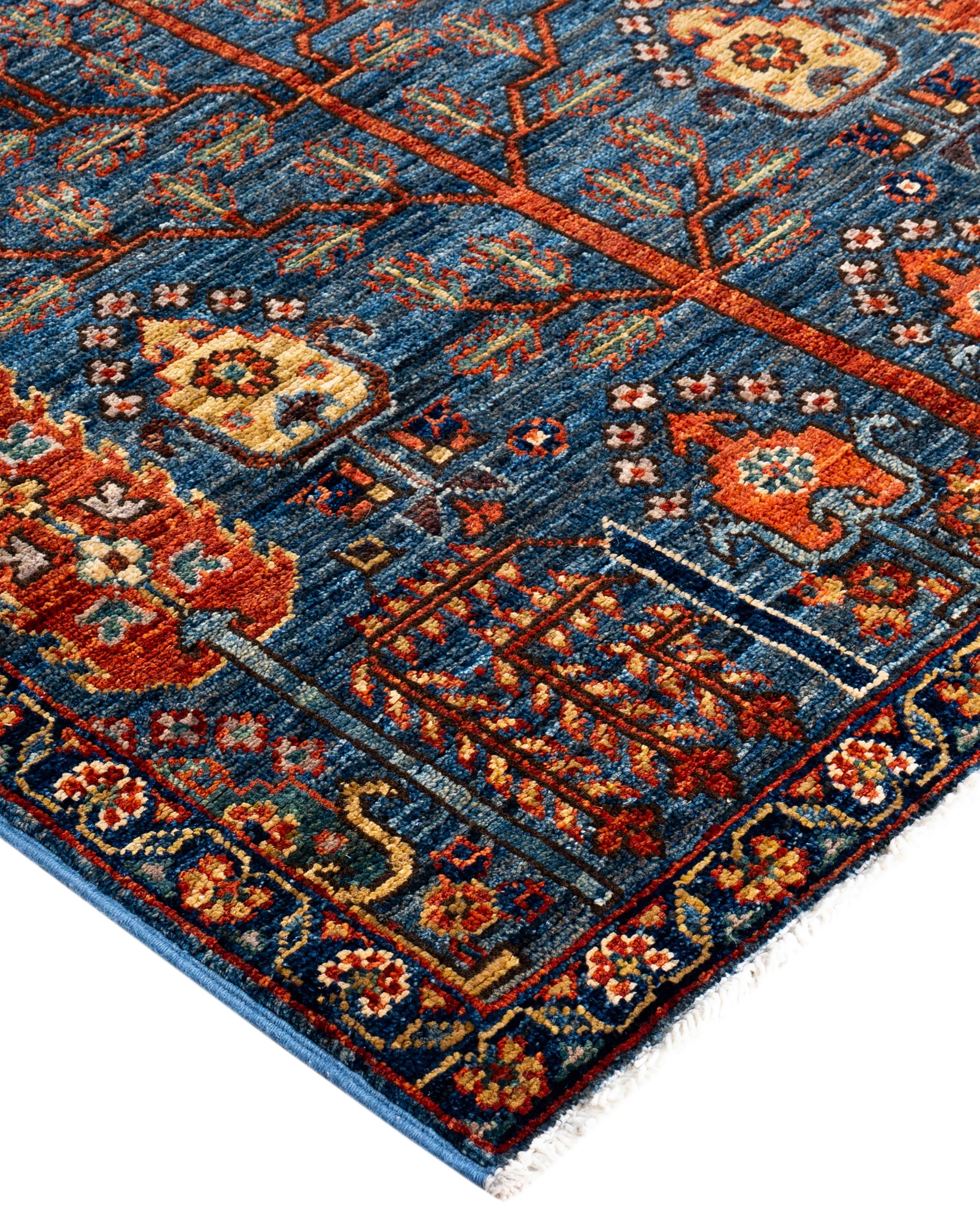 Serapi rugs are known for their bold, geometric designs and rich colors, often featuring a central medallion surrounded by intricate patterns. They typically use a warm, earthy color palette with deep reds, blues, ivory, and occasional greens. The