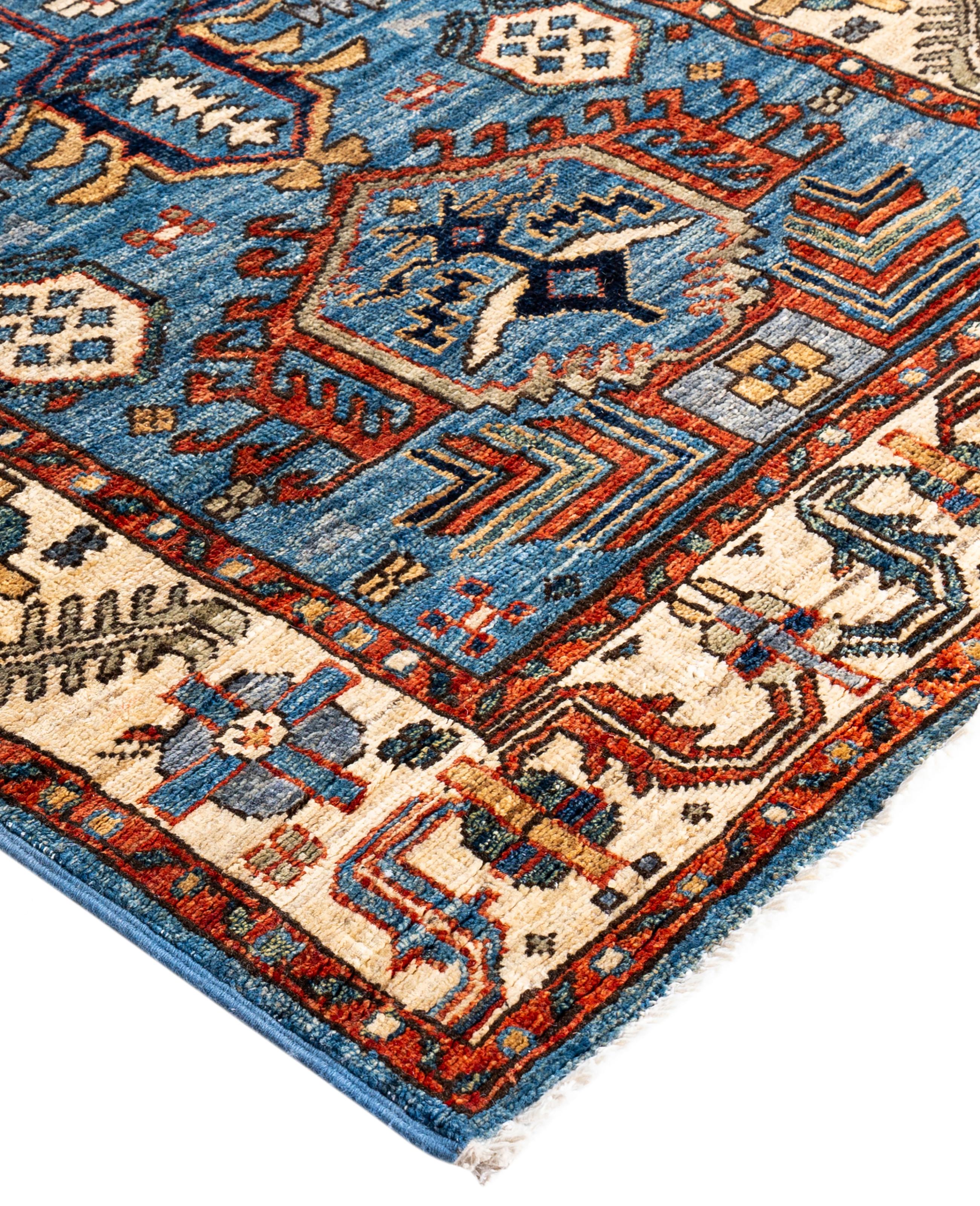 Serapi rugs are known for their bold, geometric designs and rich colors, often featuring a central medallion surrounded by intricate patterns. They typically use a warm, earthy color palette with deep reds, blues, ivory, and occasional greens. The