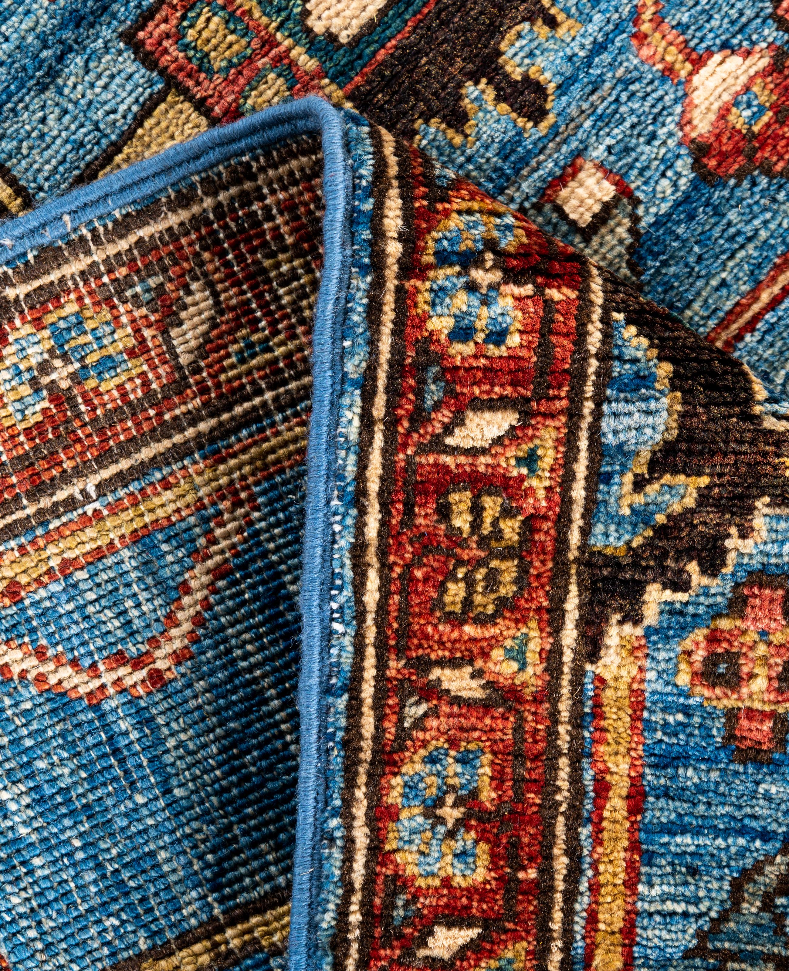XXI secolo e contemporaneo Tappeto Tribale Serapi in lana annodato a mano di colore azzurro 2' 9