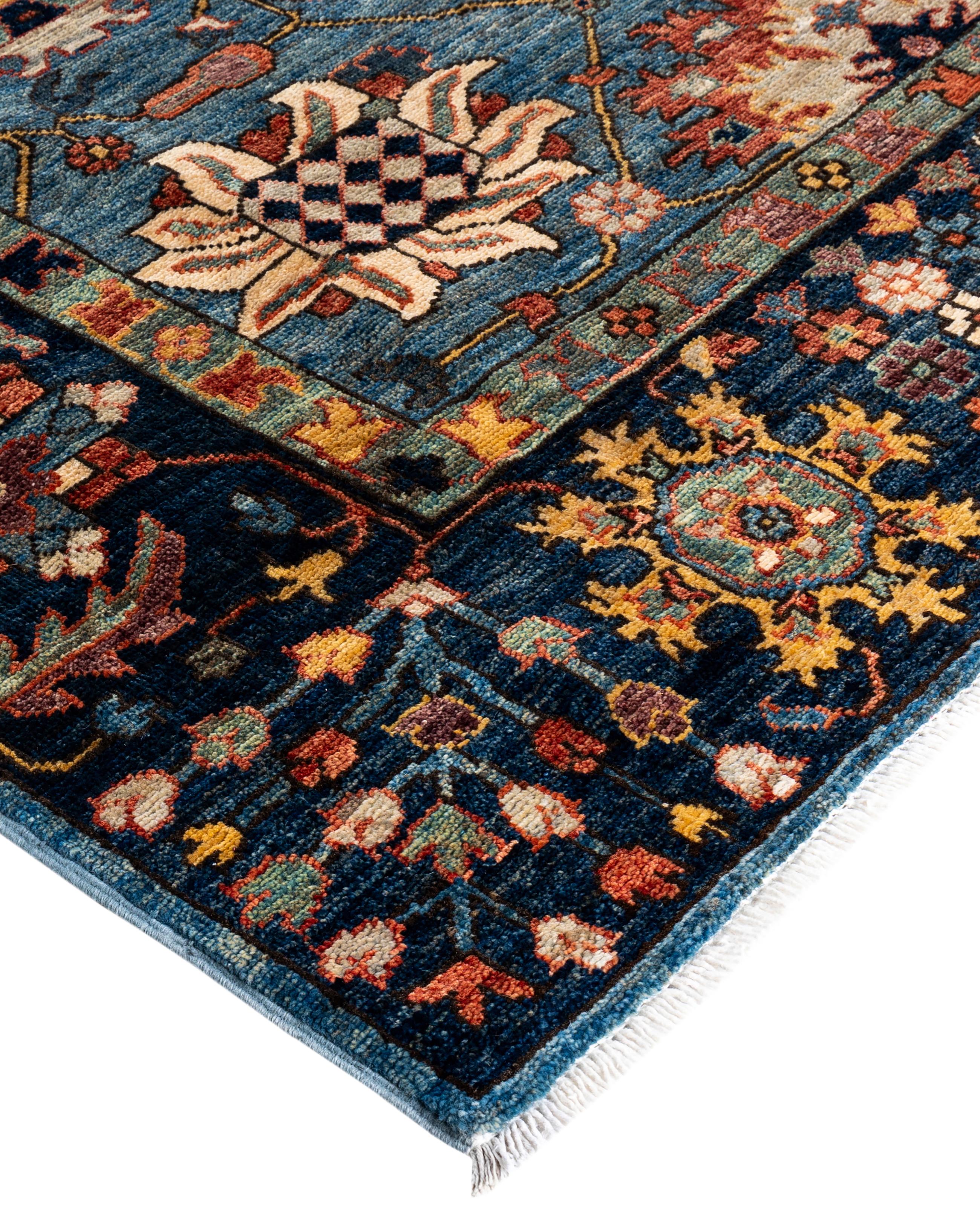 Serapi rugs are known for their bold, geometric designs and rich colors, often featuring a central medallion surrounded by intricate patterns. They typically use a warm, earthy color palette with deep reds, blues, ivory, and occasional greens. The