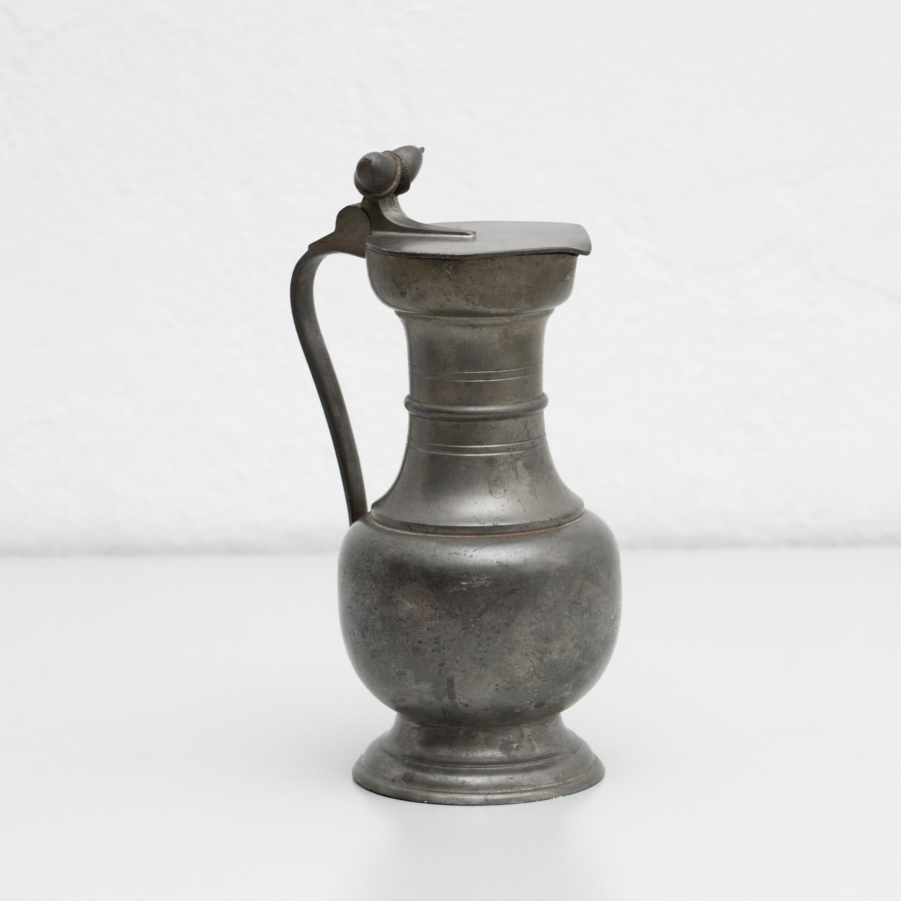 Vintage metal commemorative metal jug.    By unknown manufacturer, made in circa 1970.    In original condition, with minor wear consistent with age and use, preserving a beautiful patina.    Materials:  Metal.    