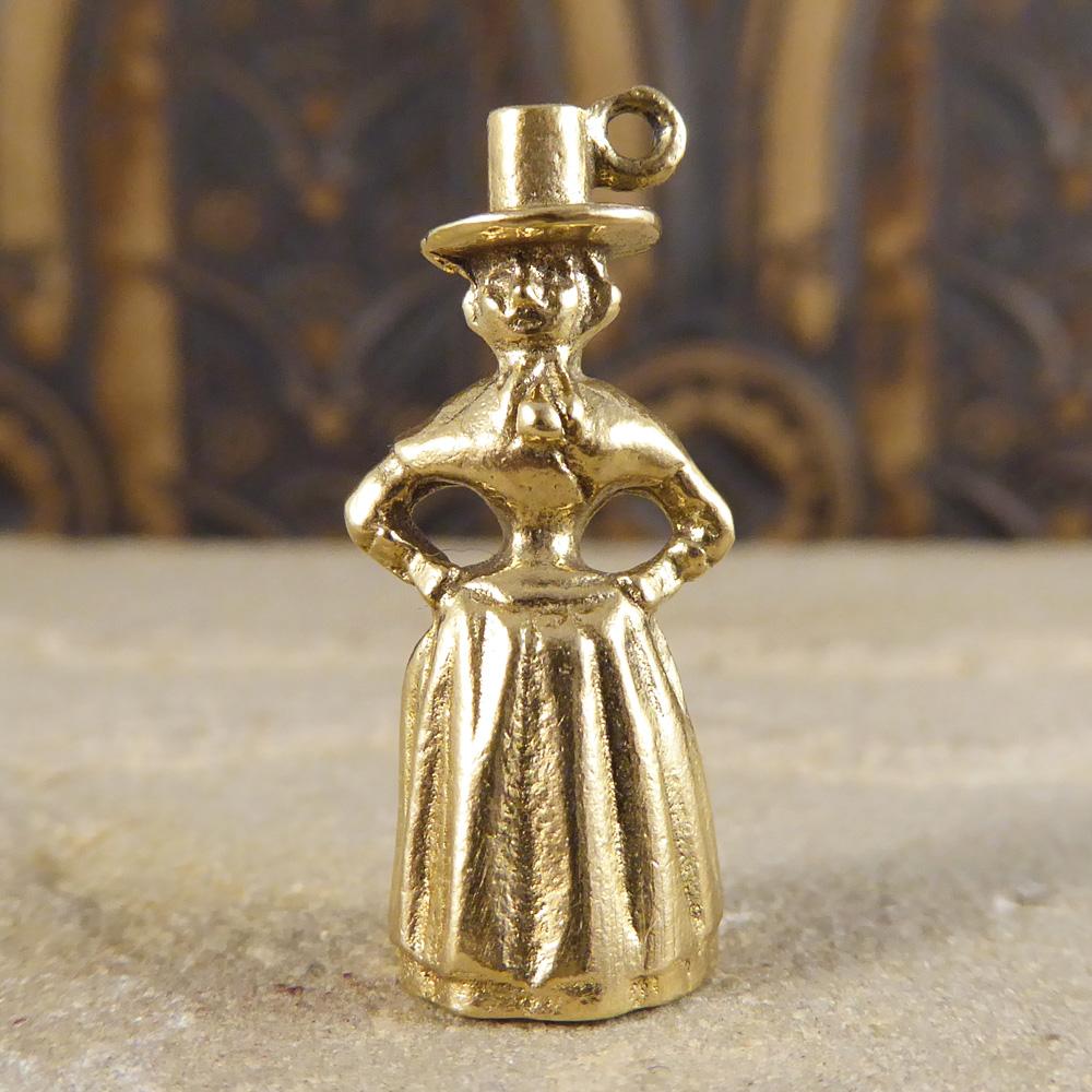 This interesting vintage charm has been crafted in 9ct yellow gold. It features a woman in the traditional Welsh costume which is a costume once worn by rural women in Wales.

Its not Clogau, but it is Welsh!

Condition: Very Good, slightest signs