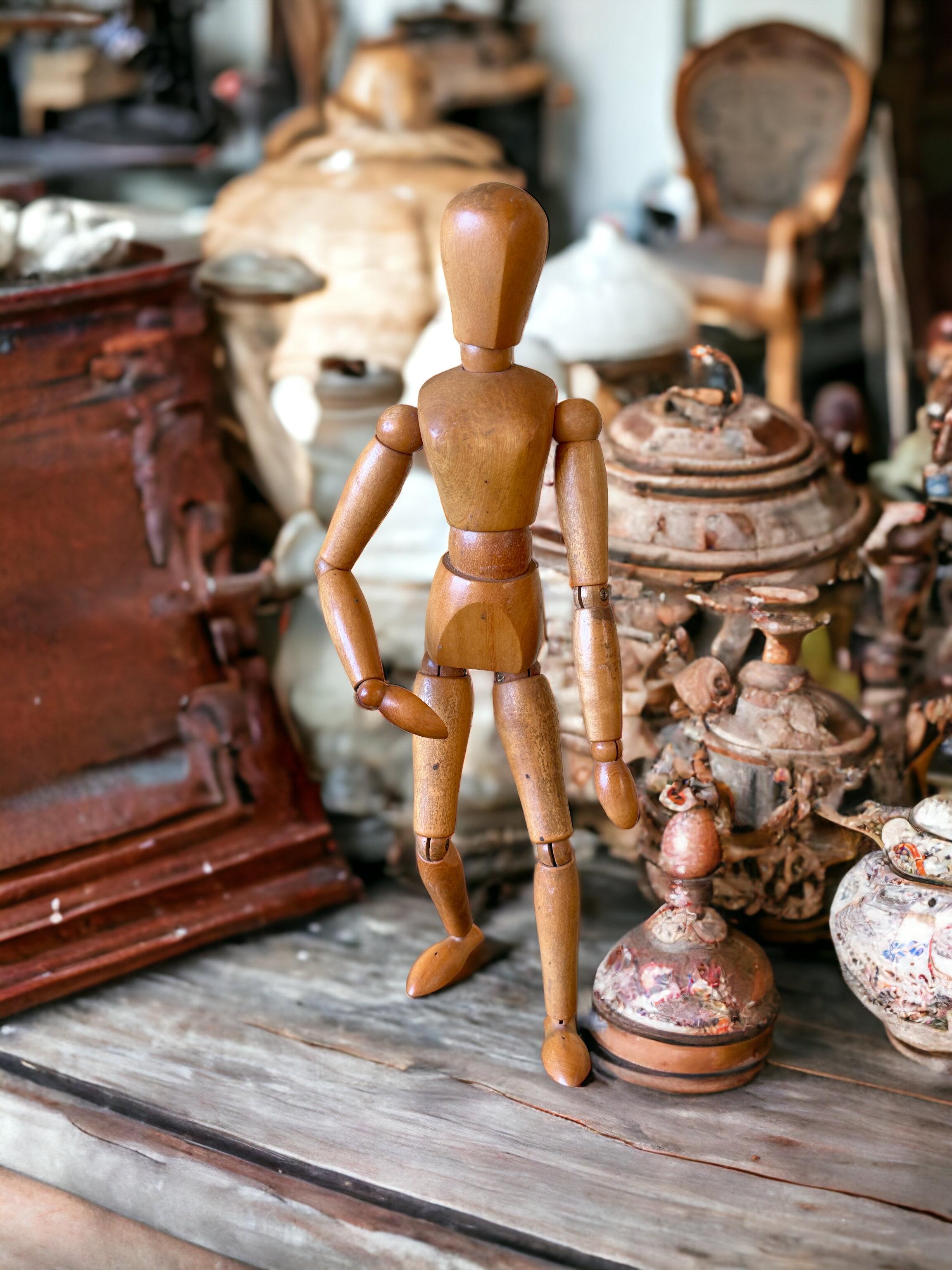 A handmade wooden Artist mannequin model - all joints move as they should. Found on a Estate sale in Verona, Italy.
Shows some wear - but looks beautiful on display! Some scratches and a nice patina due to the age. Makes a nice addition to any room. 