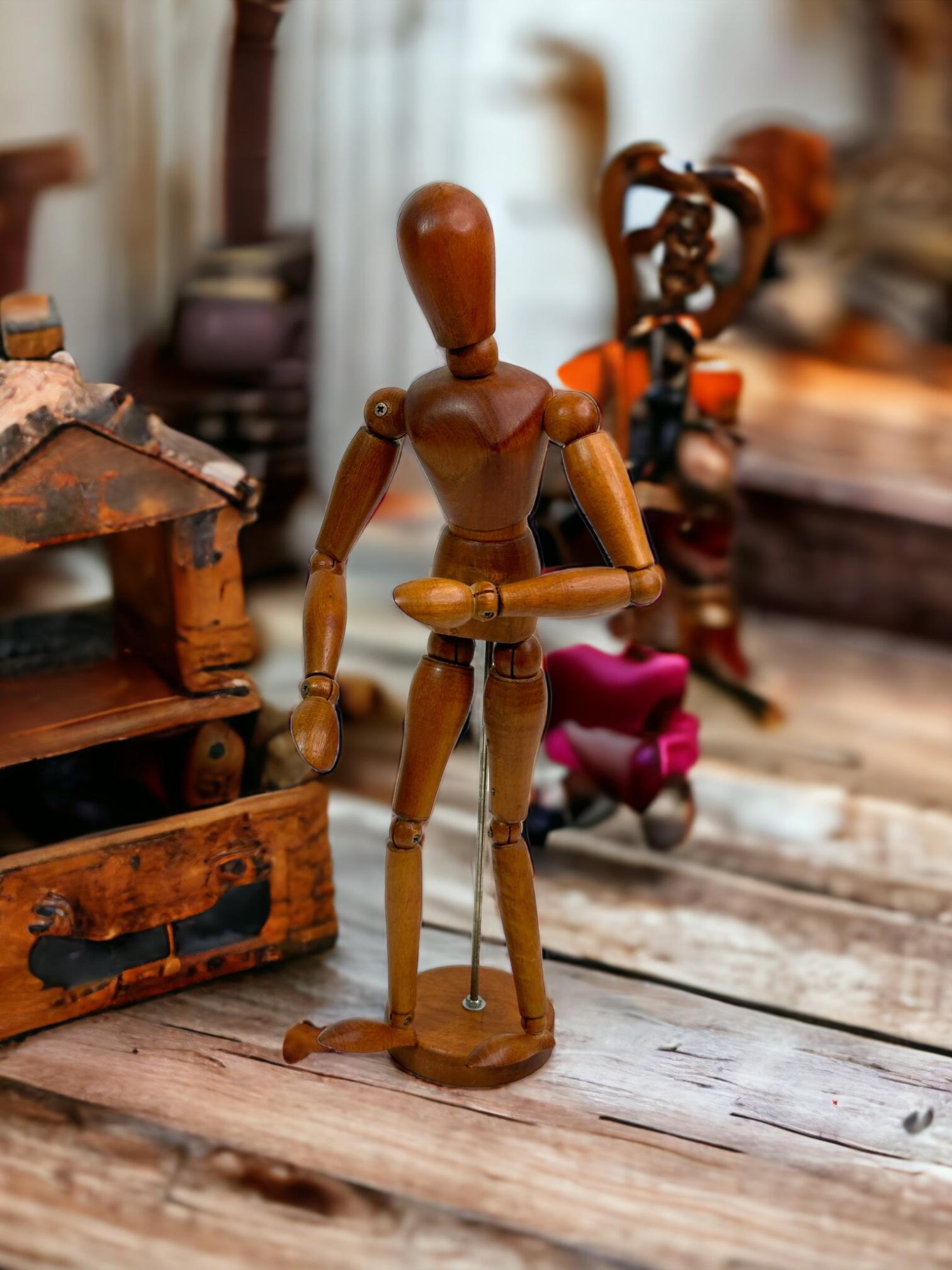 A handmade wooden Artist mannequin model - all joints move as they should. Found on a Estate sale in Verona, Italy.
Shows some wear - but looks beautiful on display! Some scratches and a nice patina due to the age. Makes a nice addition to any room. 