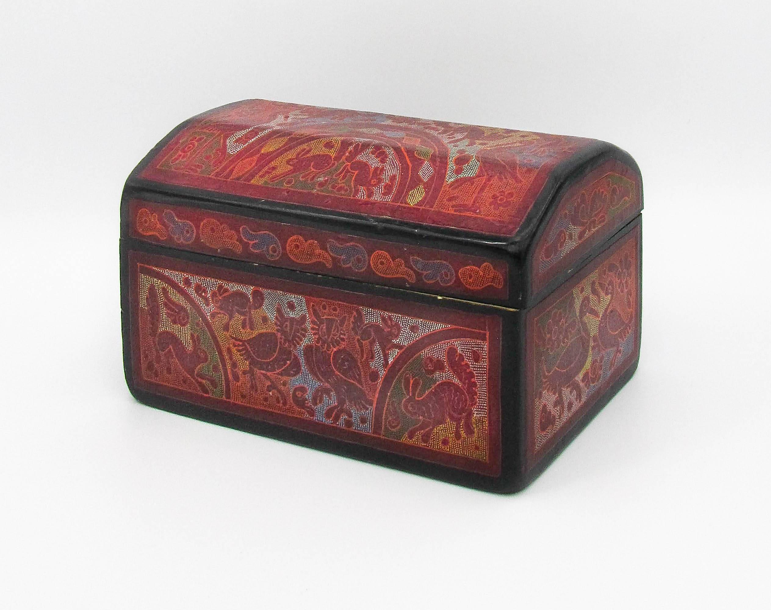 This traditional hand-painted box is representative of a technique typical of the region of Olinalá, in the state of Guerrero in southern Mexico. The most important centre of lacquer production in the country, their procedure employs chia oil -an