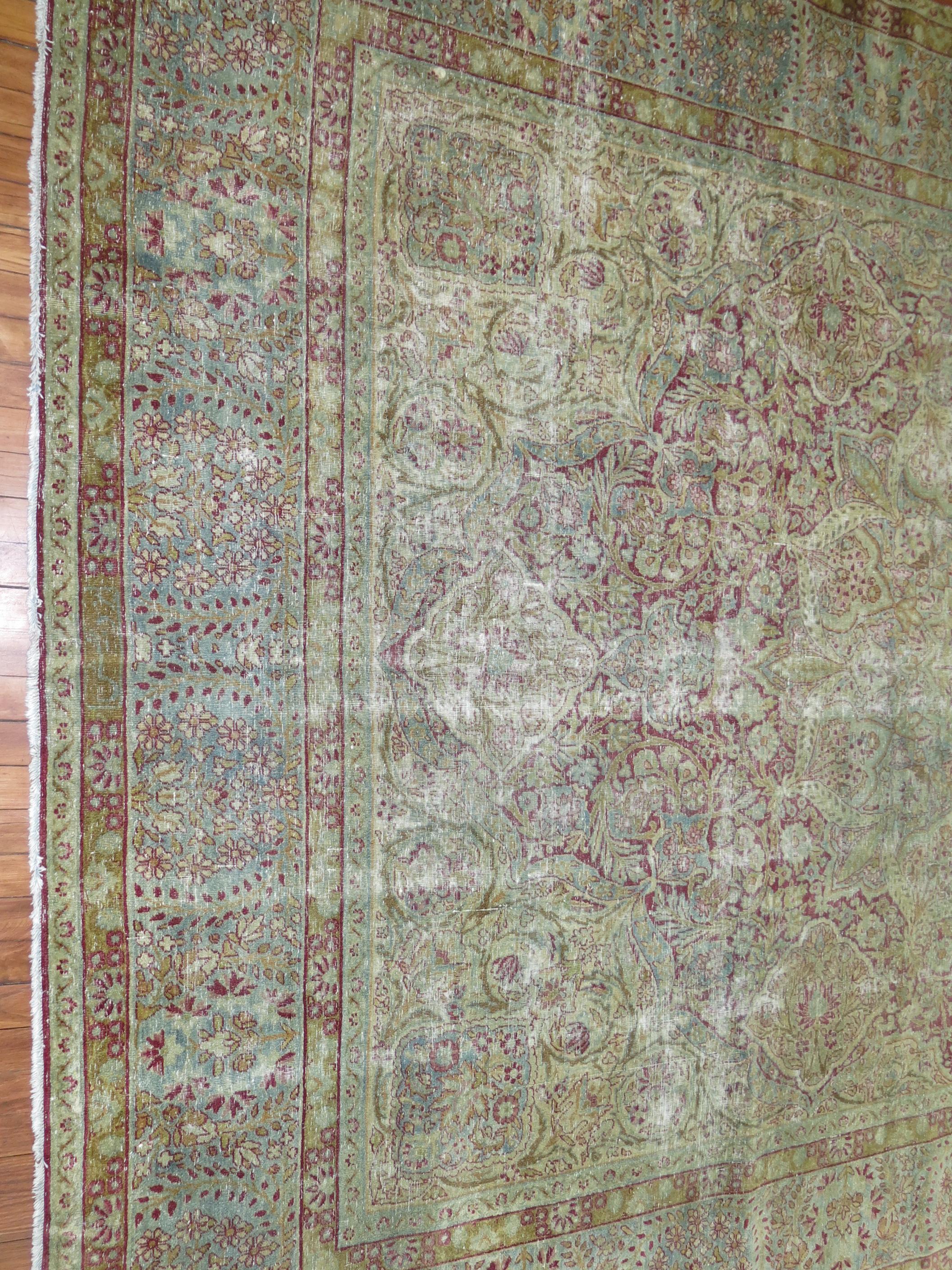Early 20th Century Traditional Worn Persian Kerman Room Size Rug For Sale