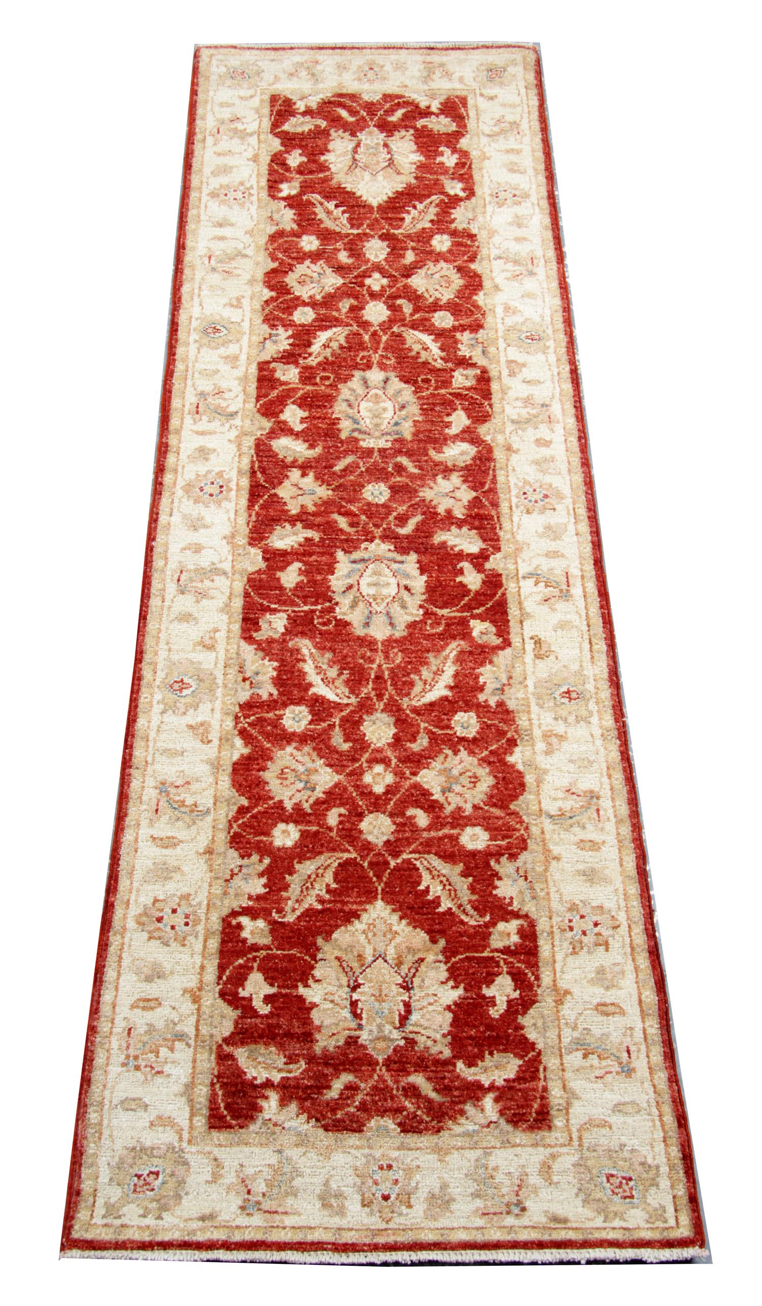 This modern Zielger runner rug features a traditional Saltanabad design. Woven on a loom in Afghanistan by master weavers. Woven with the finest hand-spun wool, which has been dyed using traditional organic vegetable dying techniques. The design