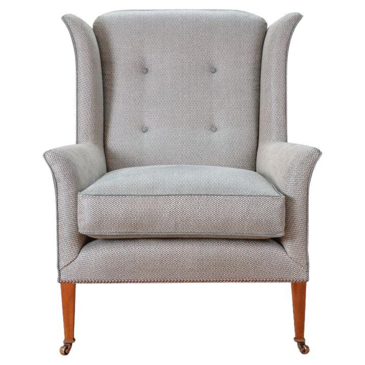 Traditionally handcrafted wingback chair by Beaumont & Fletcher For Sale