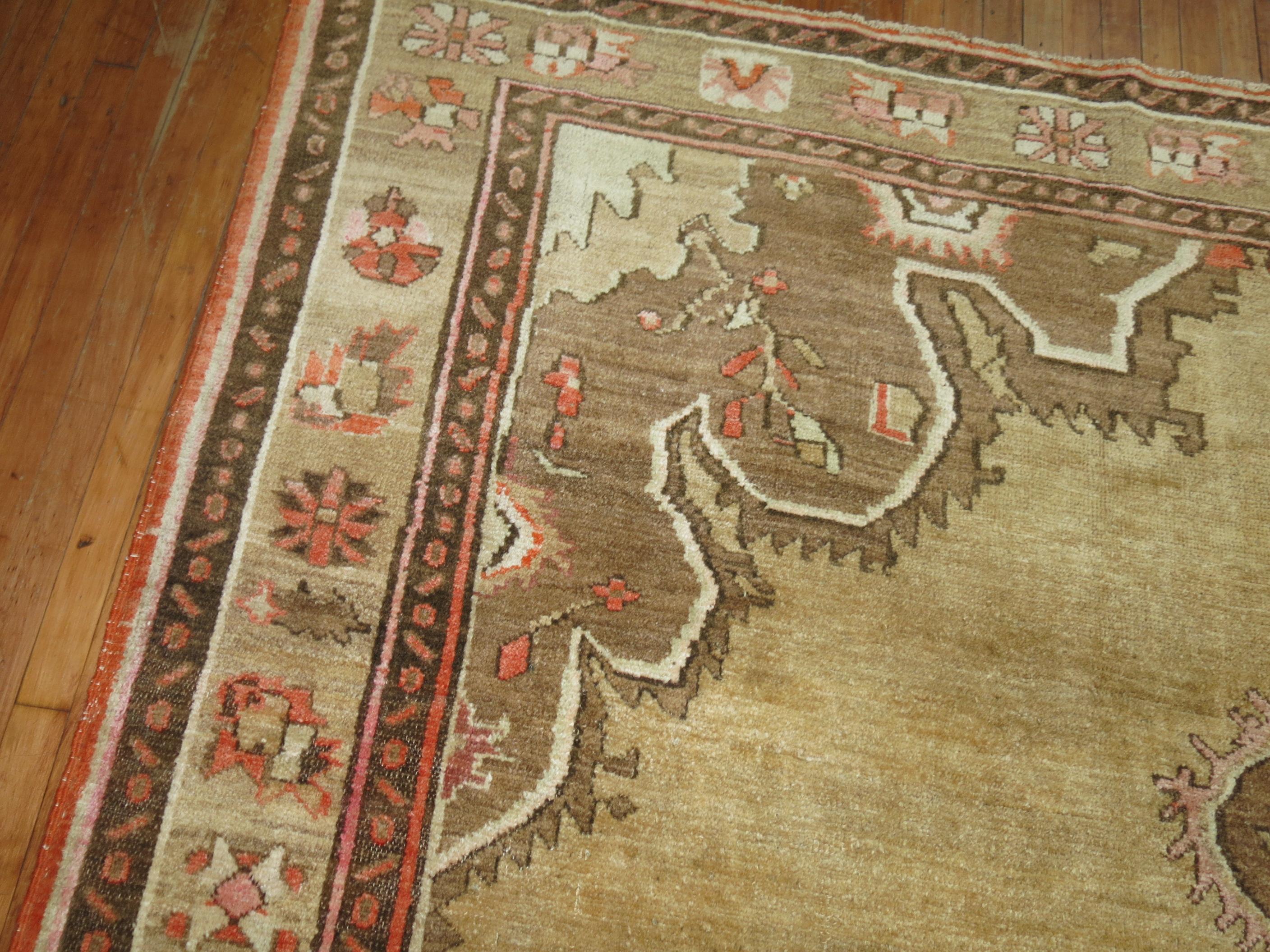 Room size Turkish Kars rug with a traditional medallion and border design on a beige ground dated 1986

Measures: 8'2