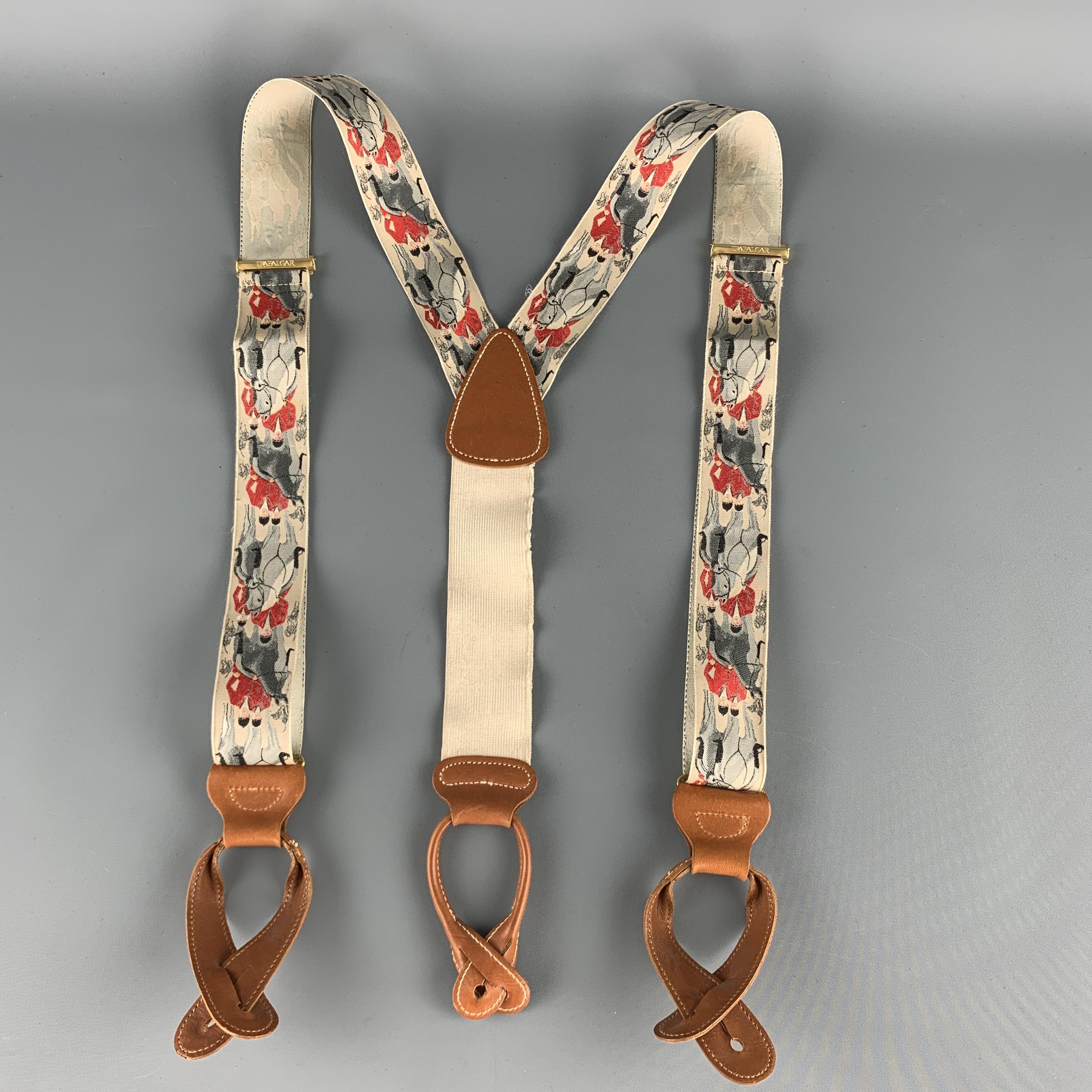 Vintage TRAFALGAR braces feature light beige equestrian print adjustable straps and tan leather accents. 

Good Pre-Owned Condition.

Strap Width: 1.75 in. 