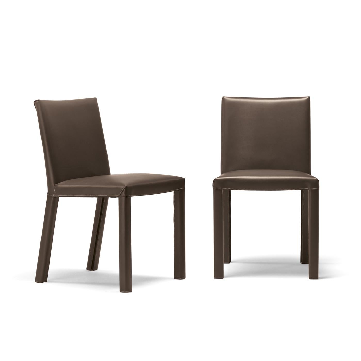 This padded chair is both prestigious and comfortable. Its terra-colored leather covering and simple, fluid lines make it fit into either a residential or business environment. The style also features a steel frame and and polyurethane padding. A
