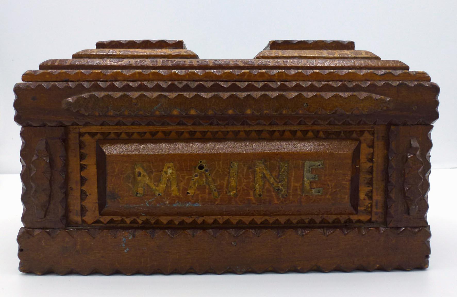 This is a tramp art bank with a beautiful alligatored surface. It is dated 1926 on the top, with the words 