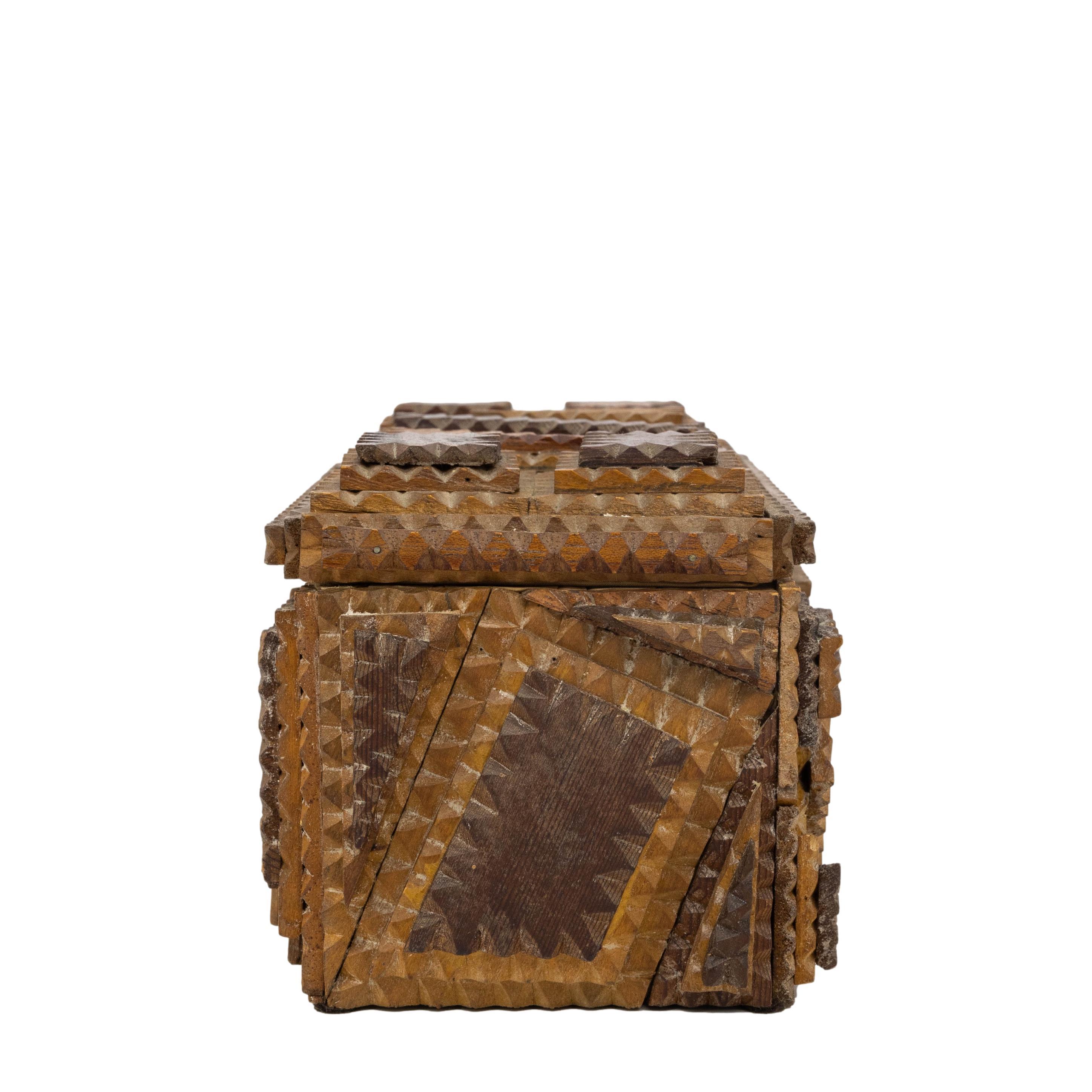 Hand-Carved Tramp Art Lift-Top Box with Notched and Layered Geometrical Design, ca. 1920 For Sale