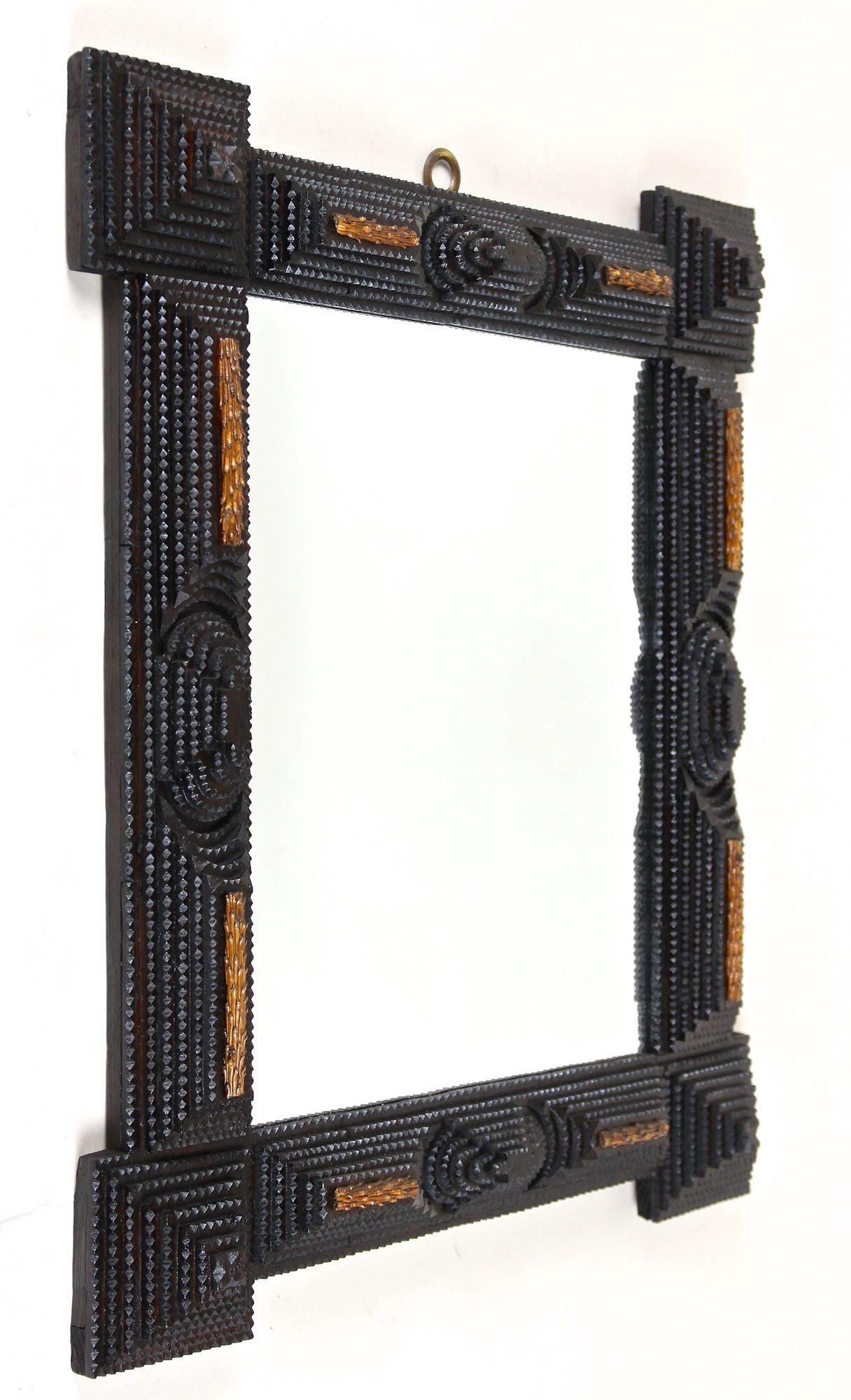 Extraordinary Tramp Art mirror from the late 19th century around 1890. Beautifully crafted out of hand carved basswood elements, this fantastic Tramp Art work out of Austria was done in the so called 