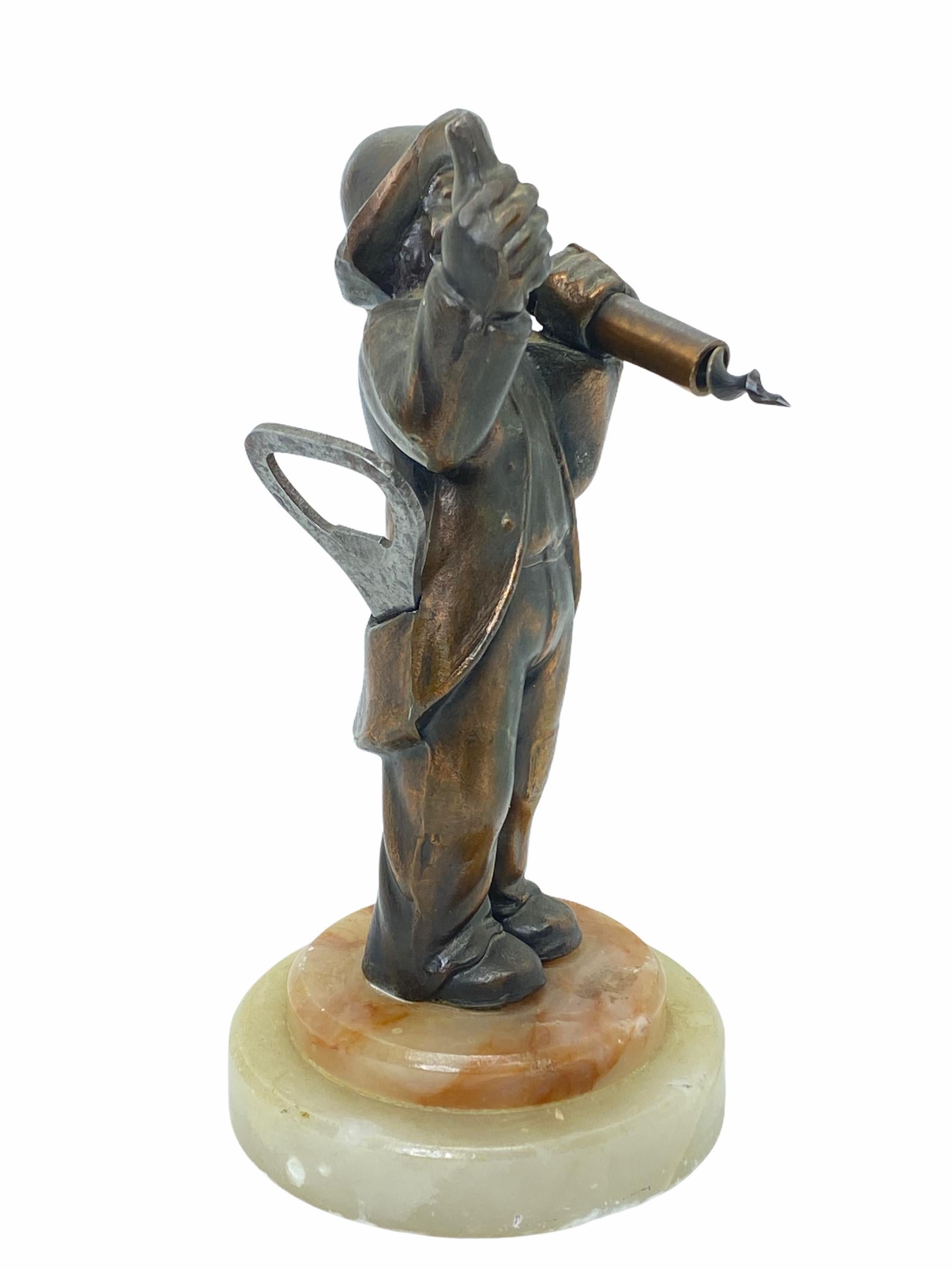Classic early 1960s German Metal figurine on a marble base. Holding a corkscrew in the left hand and has a bottle opener in his pocket. Nice addition to your room or just for your collection of Barware. Found at an estate sale in Vienna, Austria.