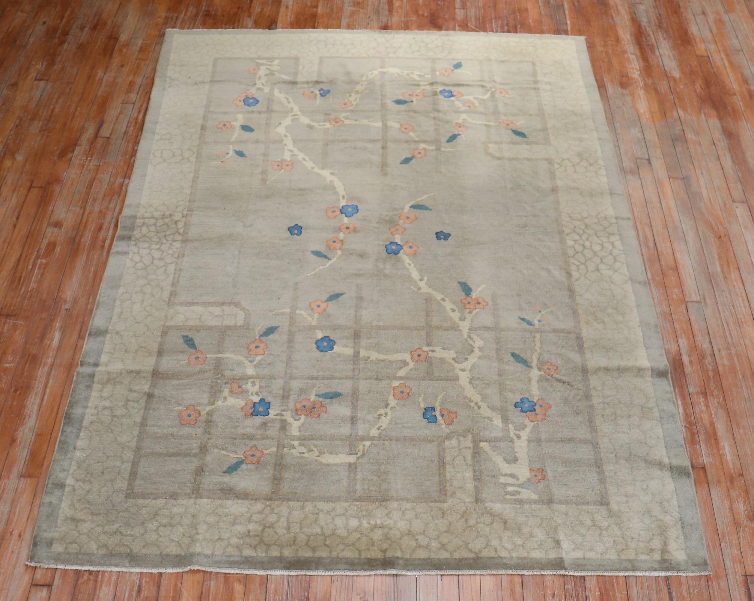 Beautiful early 20th century Chinese rug with a lovely floral pattern on a gray field

Measures: 6'2'' x 8'8''.