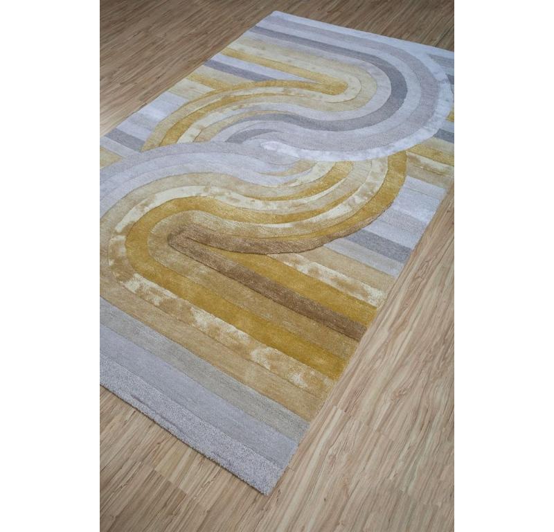 Et si les teintes vibrantes des vitraux et les motifs hypnotiques des kaléidoscopes étaient reproduits sur un tapis ? Admirez cette merveille moderne fabriquée par des artisans qualifiés dans les régions rurales de l'Inde. Tufté à la main avec soin,