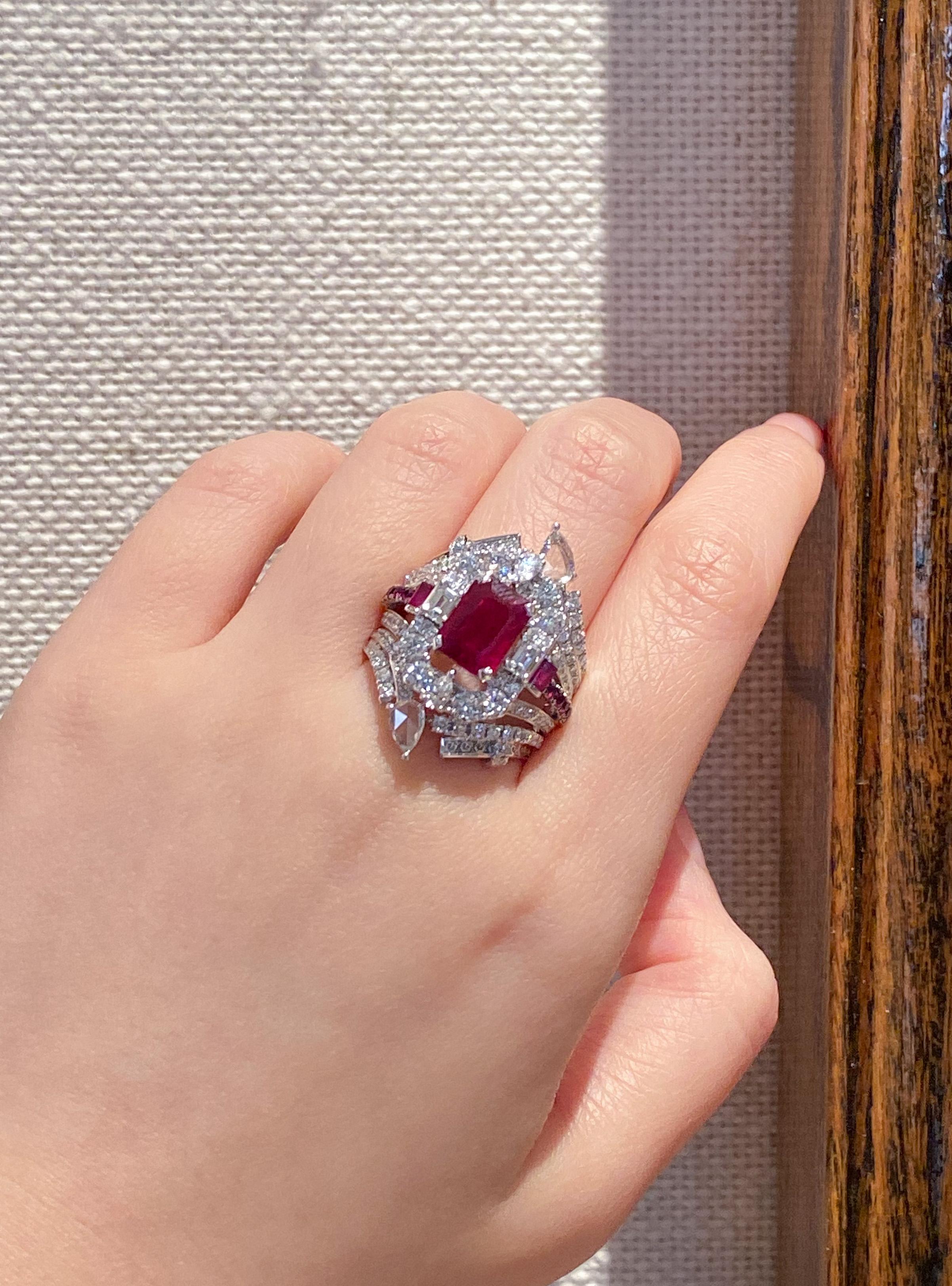 Dilys' 18 karat white gold transformable cocktail ring is set with a 2.07 carat GRS-certified Burmese Pigeon's Blood Ruby centre stone, featuring a deep yet transparent red. Transformable and versatile, this ring can be worn simply as a solitaire
