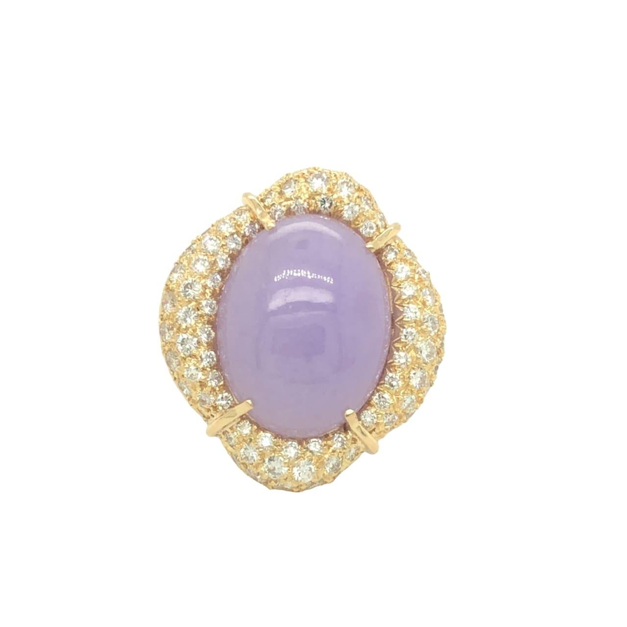 This exquisite convertible handcrafted 18k yellow gold ring features an oval shaped cabochon lavender jade. The center stone is enclosed in a unique design of 18K yellow gold with approximately 3.50 carats of round brilliant cut diamonds F color and
