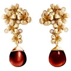 Transformer Yellow Gold Modern Style Cocktail Earrings with Diamonds and Garnets