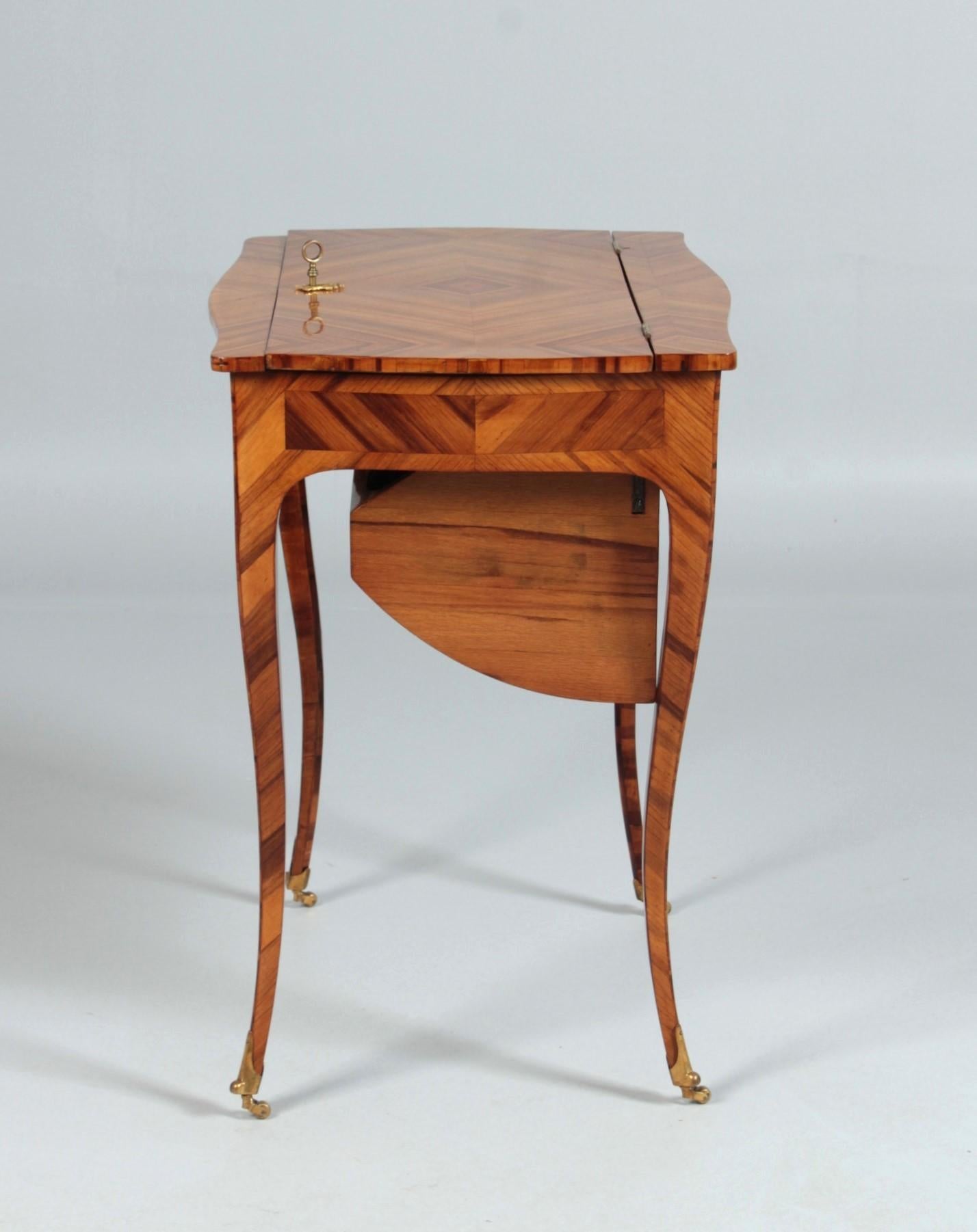 Convertible small desk - so-called Secrétaire à culbute

France
19th c.

Dimensions: H x W x D: 70 x 65 x 47 cm

Description:
Quite rare and unusual Louis XV style transforming furniture.

When closed, we see a side table on curved flared legs in