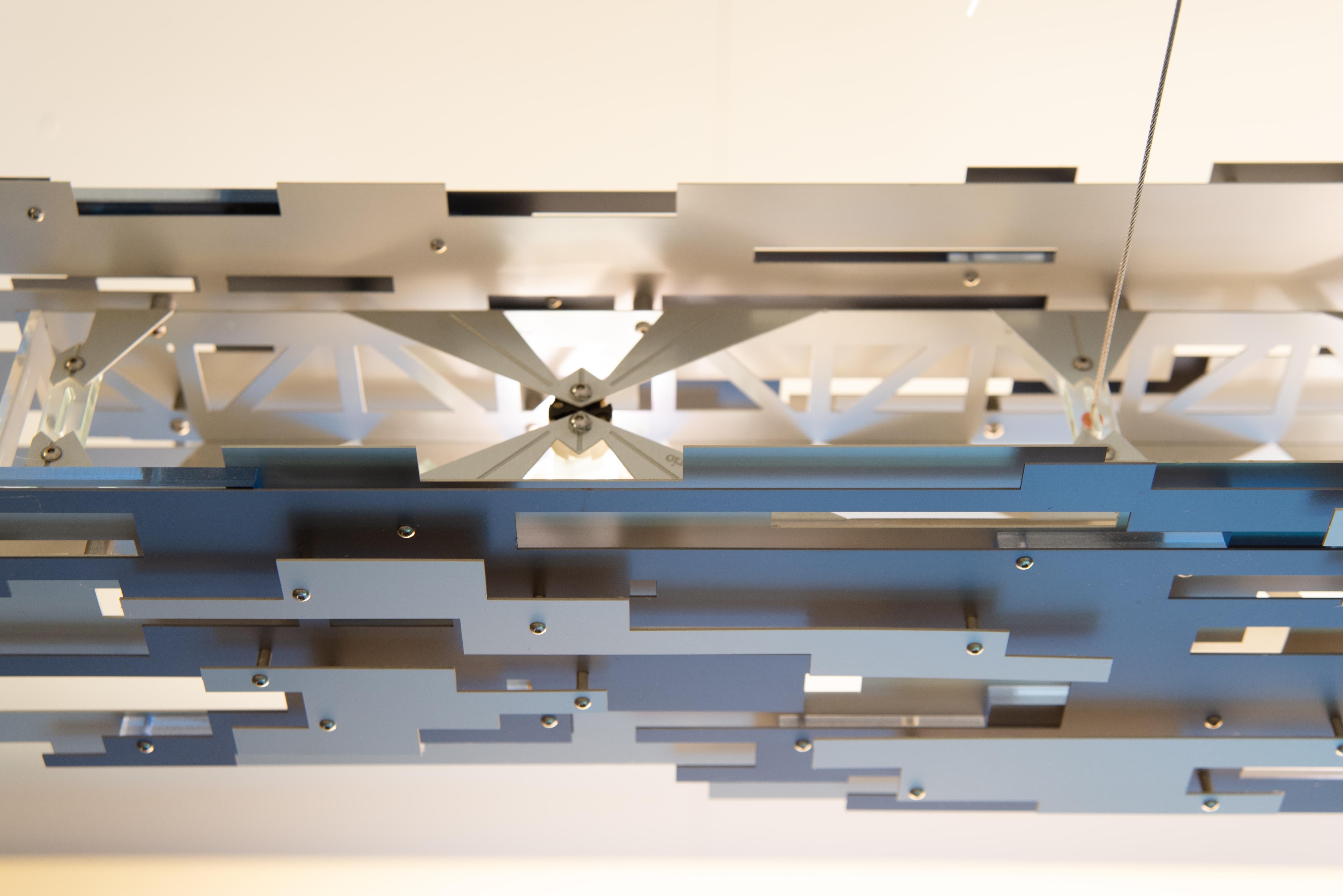 Anodized Transit Linear Chandelier in Blue and Silver Aluminum by David D’Imperio For Sale
