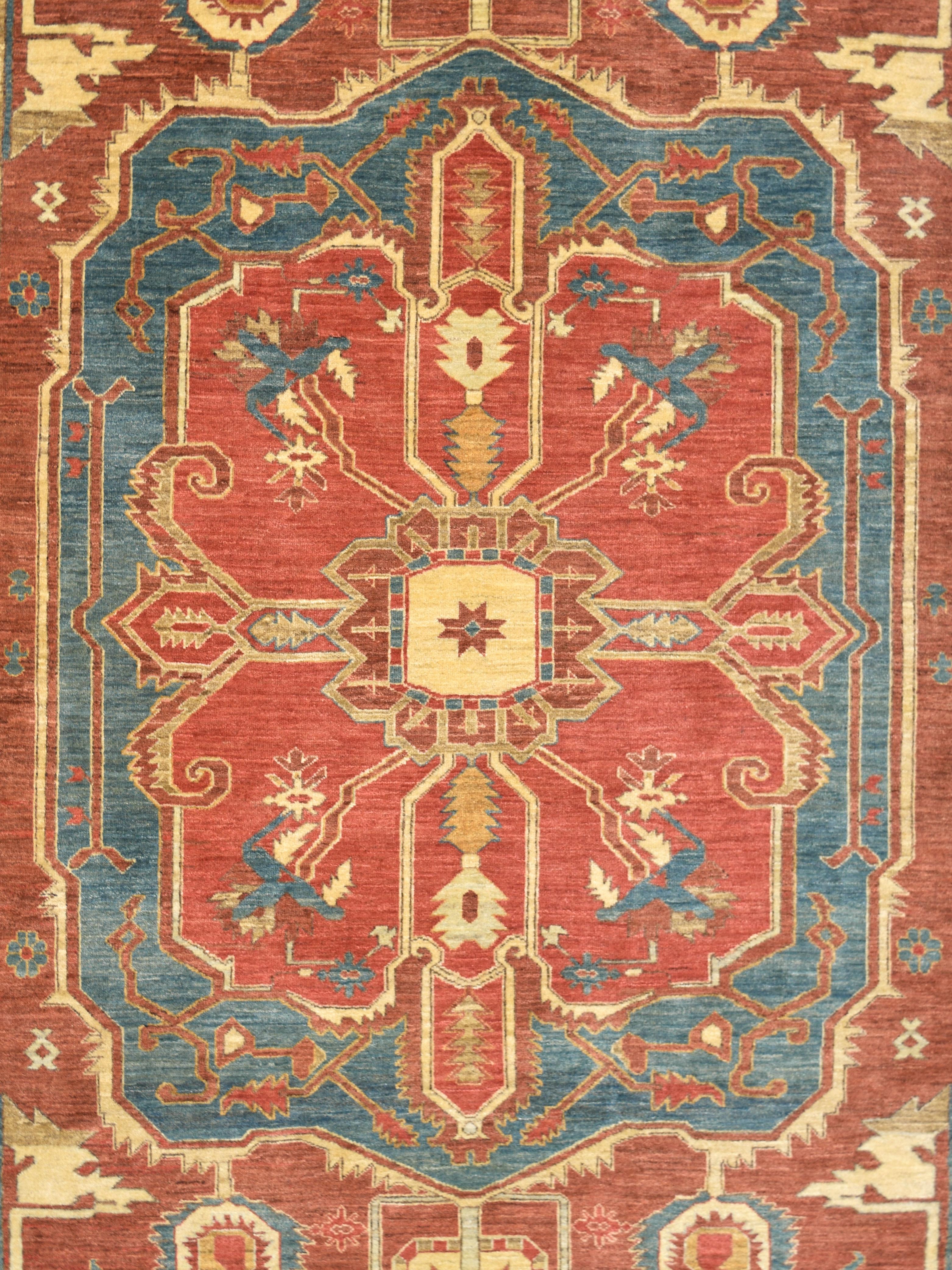 Wool Transitional Bidjar Heriz from Orley Shabahang’s Formal Collection 9’ x 12’.
In full bloom, this warm and transitional Persian Heriz Serapi carpet measures exactly 9' x 12' and belongs to the Orley Shabahang Formal Collection. Typical of Serapi