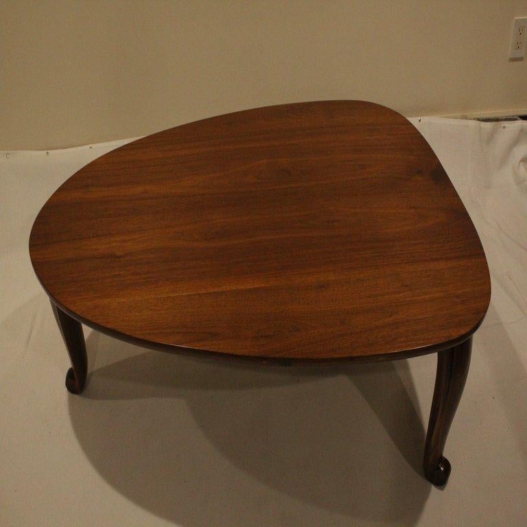 Handcrafted Transitional Coffee Table in Solid Walnut

This handcrafted coffee table is a true reflection of refined craftsmanship and organic design. Created from a single solid block of walnut, this piece offers timeless beauty with a contemporary