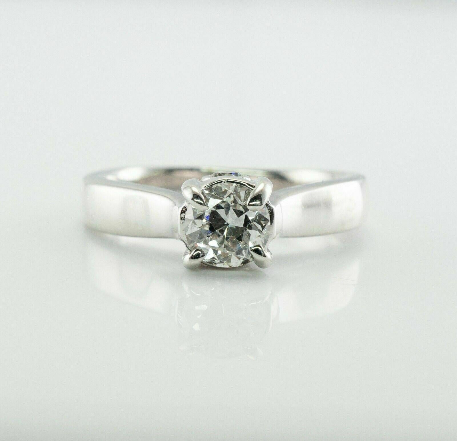 Transitional cut Round Diamond Ring 18K White Gold Hallmarked Delia 

This gorgeous estate engagement ring is finely crafted in solid 18K White Gold and also hallmarked 