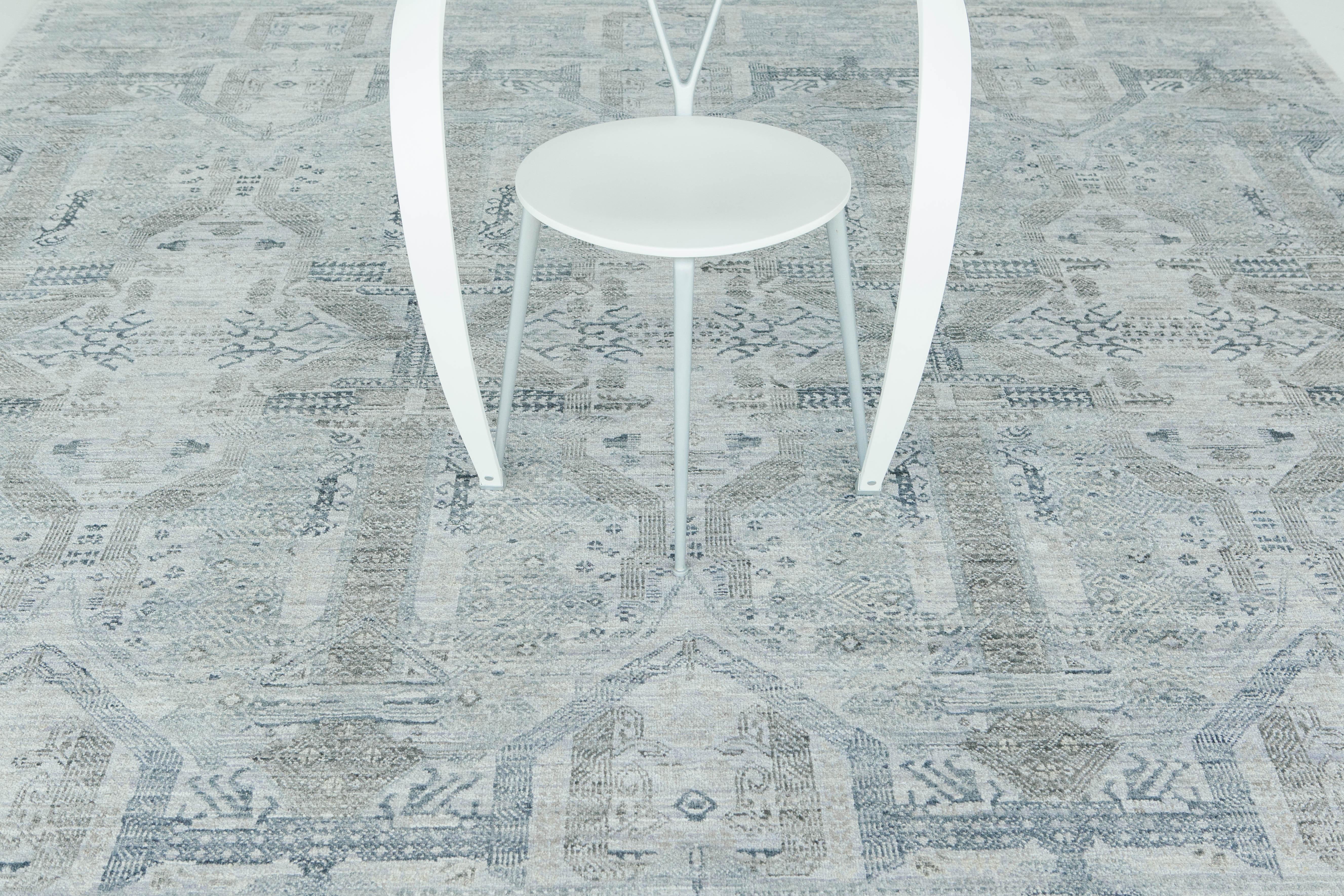 'Gambol' is the perfect intersection between traditional and contemporary designs. This rug's detailed knotting creates beautiful motifs that are luxurious and timely in the perfect blues and hints of green. This rug will definitely bring