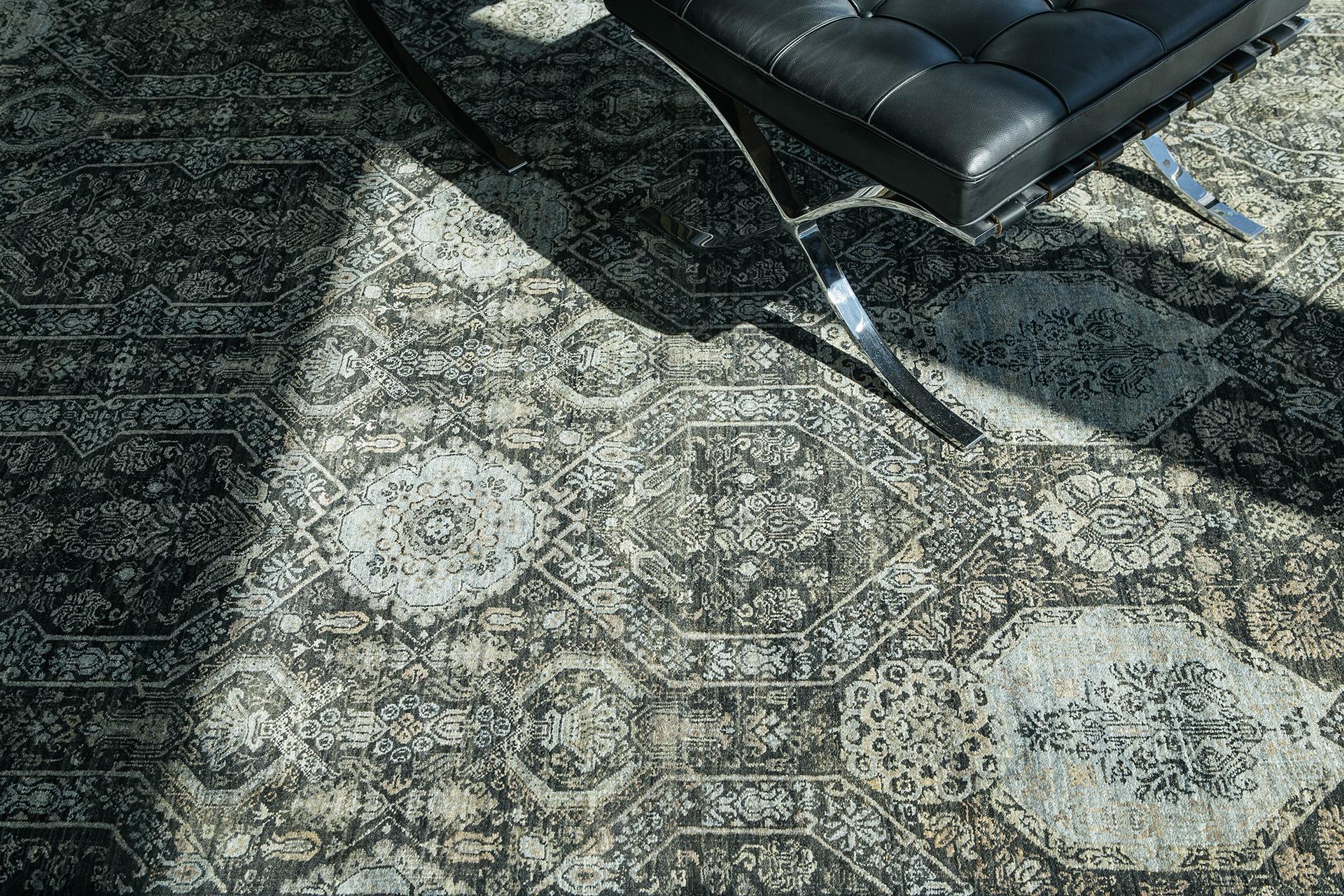 All-over design in deep grey, silver and pale coppery tones. The pattern features tile and medallion shapes elaborated with traditional palmettes, florals and embellishments. Abrash throughout creates a harmonizing effect.

Rug number: