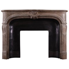 Transitional French Louis XIV / XV Limestone Fireplace