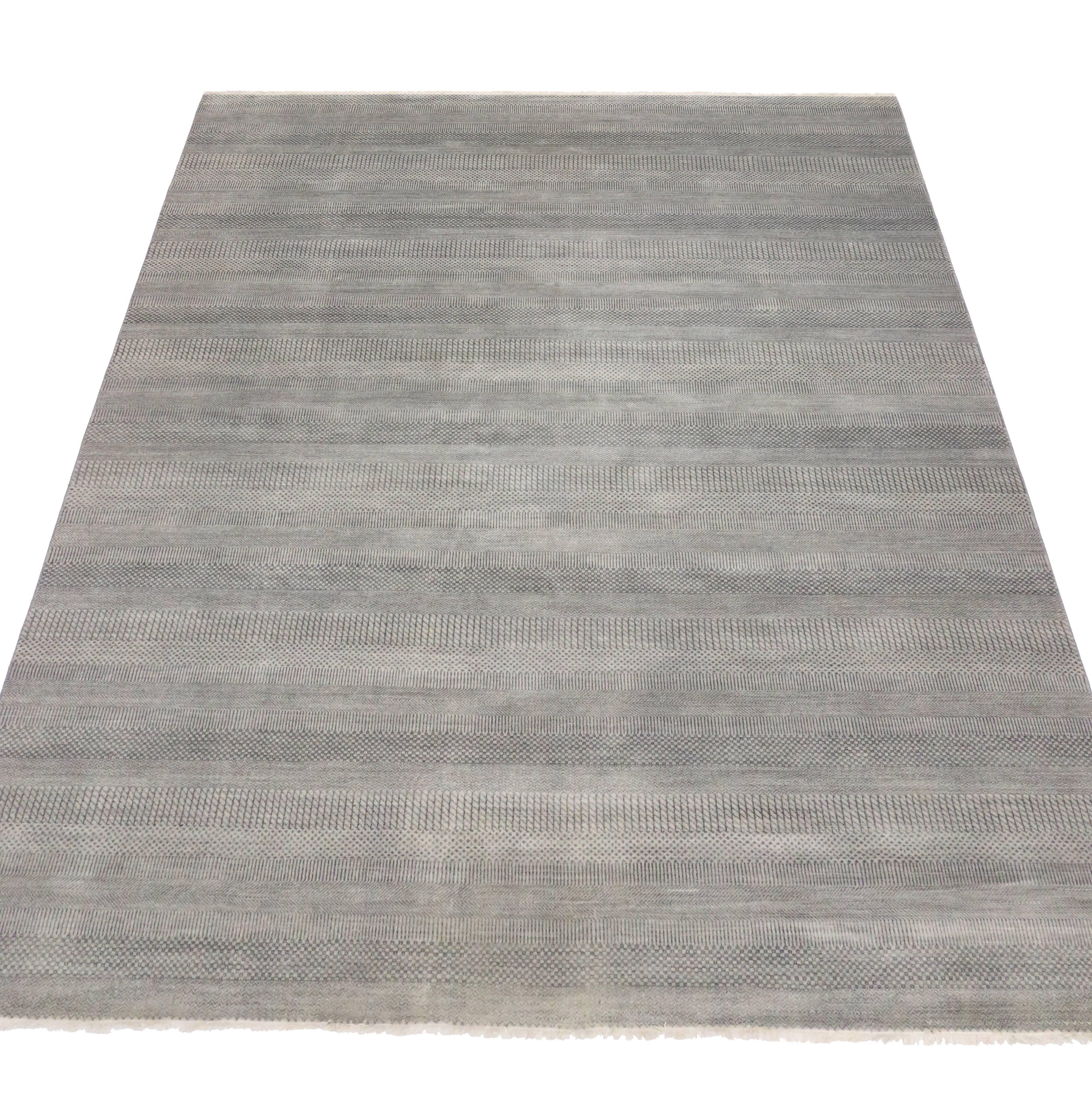 30011 Transitional Gray Area Rug with Minimalist Contemporary Style. Striking in its style and delicate beauty, this transitional gray area rug features a subtle geometric pattern with contemporary minimalist style. The cool and casual light gray
