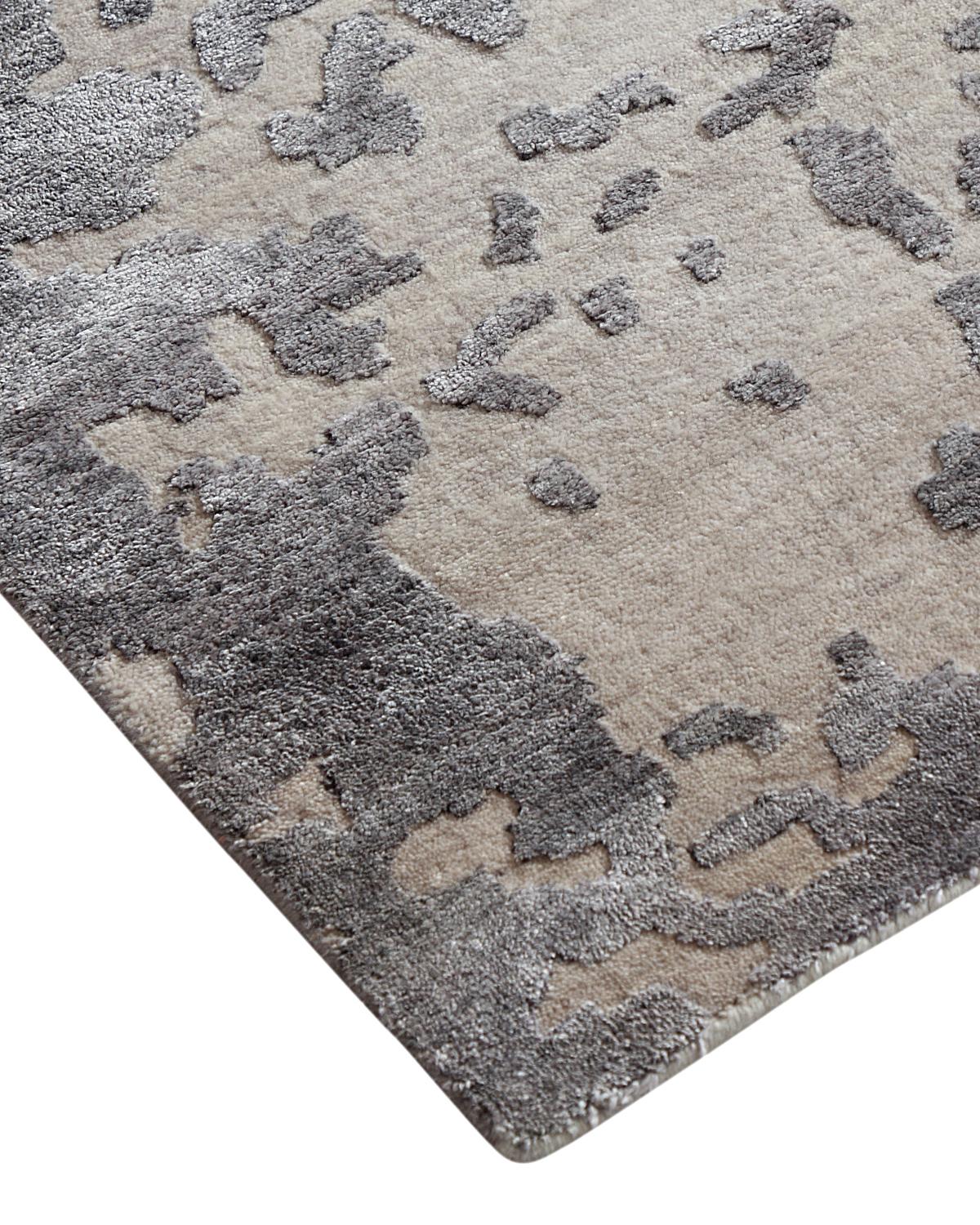 Color: Gray - Made In: India. 70% Wool, 30% Viscose. Fresh, spirited, and above all, luxurious, the rugs of the Modern collection can invigorate a traditional room as gracefully as they can ground a more contemporary space. Regardless of their color