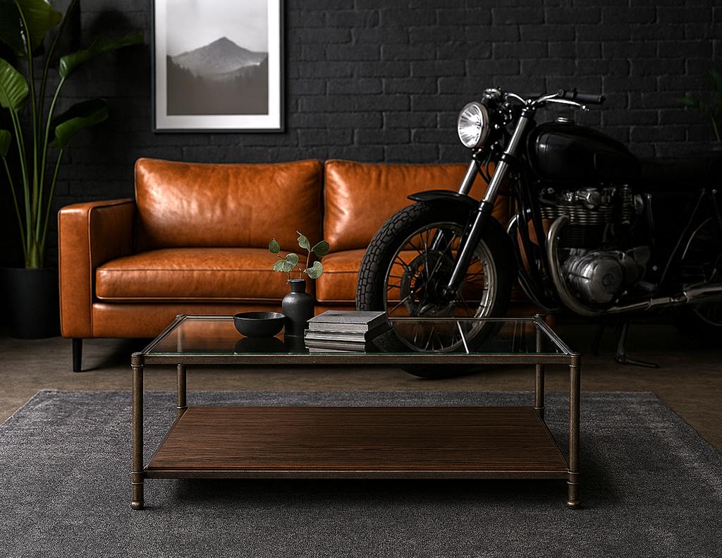 Cette table basse transitionnelle à deux niveaux trouve un équilibre raffiné entre l'arête industrielle et l'élégance moderne. Dotée d'un cadre en métal brossé dans un ton gris foncé avec des détails subtils, la pièce est surmontée d'une surface en